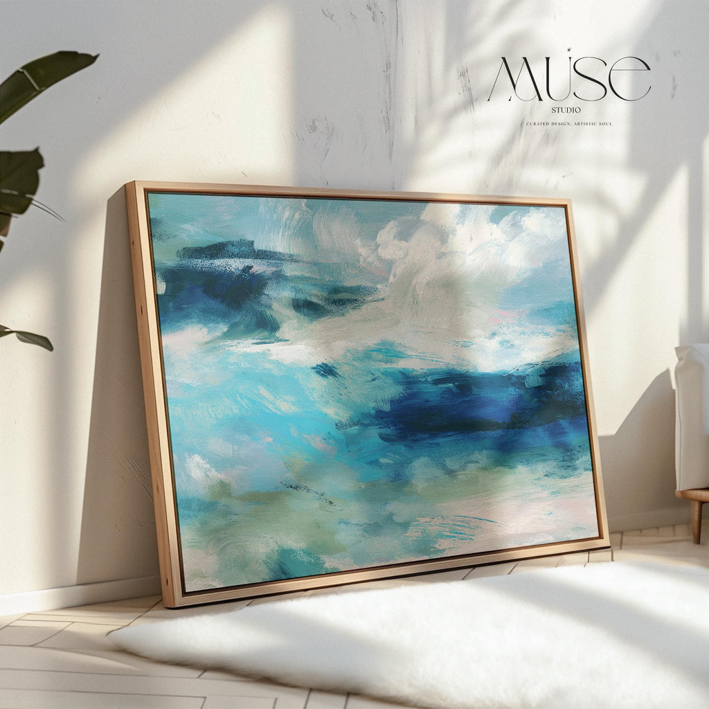 Framed horizontal canvas wall art featuring a coastal abstract with soft blue, sage green, and navy brushstrokes. Designed in a calming, fluid style ideal for beach house interiors, coastal living rooms, or nature-inspired decor. Available as a fine art poster or canvas wall art for curated, color-forward decor.