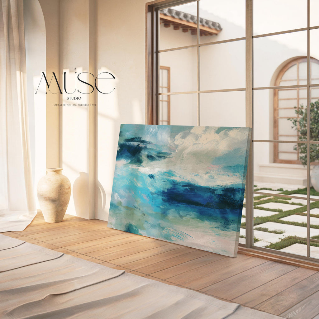 Horizontal coastal canvas wall art featuring layered strokes of ocean blue, sage green, and soft white in an abstract seascape style. Designed for serene, nature-inspired interiors like beach houses, living rooms, and entryways. Available as a fine art poster or canvas wall art for curated, color-forward decor.