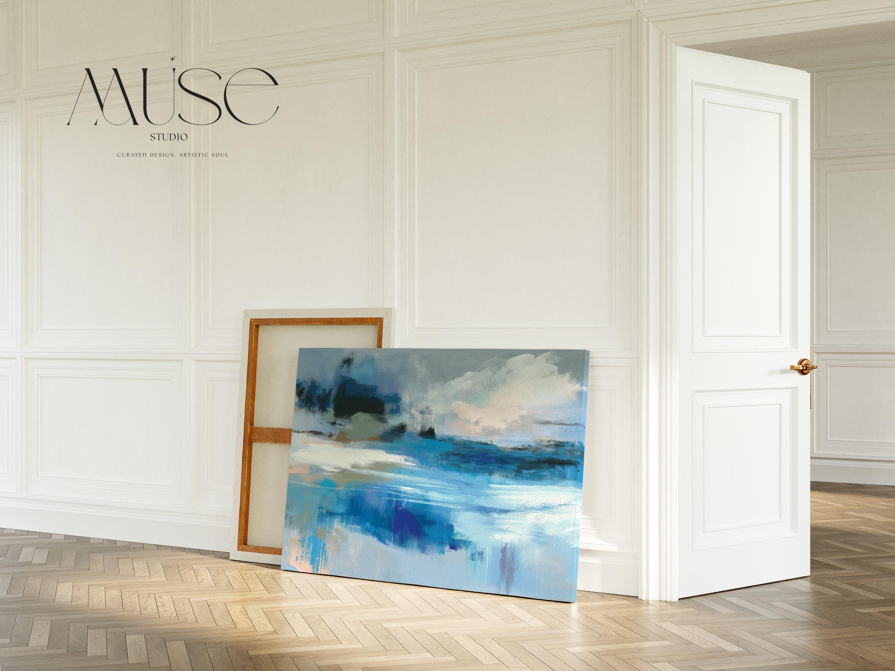 Horizontal abstract canvas wall art featuring layered blue, aqua, and sand brushstrokes in a coastal-inspired composition. Ideal for modern interiors, spa rooms, or transitional living rooms seeking soft muted color palettes. Available as a fine art poster or canvas wall art for curated, color-forward decor.