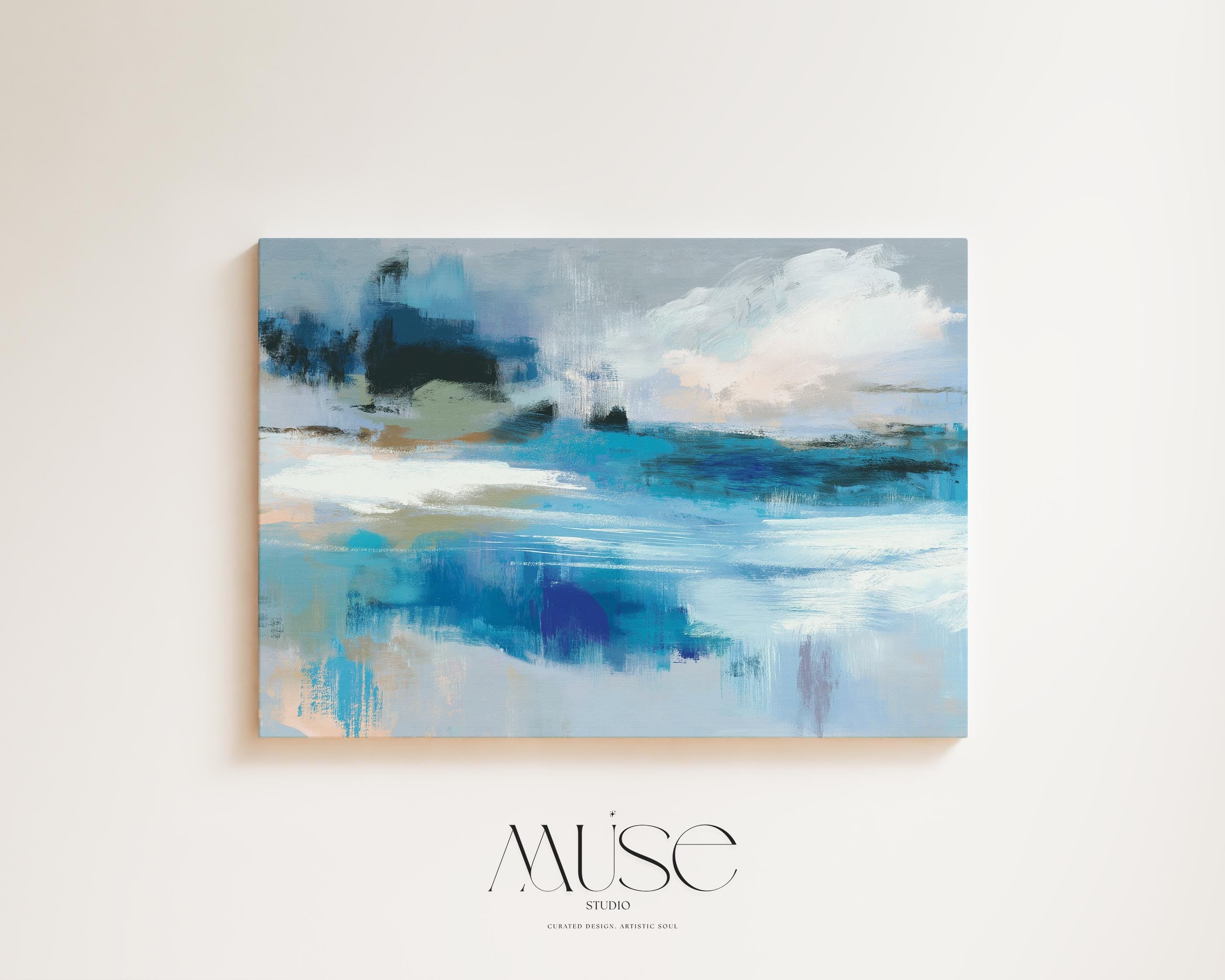 Oversized blue coastal abstract wall art with soft white clouds and ocean-inspired brushstrokes, leaning against paneled walls in a sunlit room. Muted coastal horizon artwork available as framed wall art, canvas, or fine art print by Muse Studio.