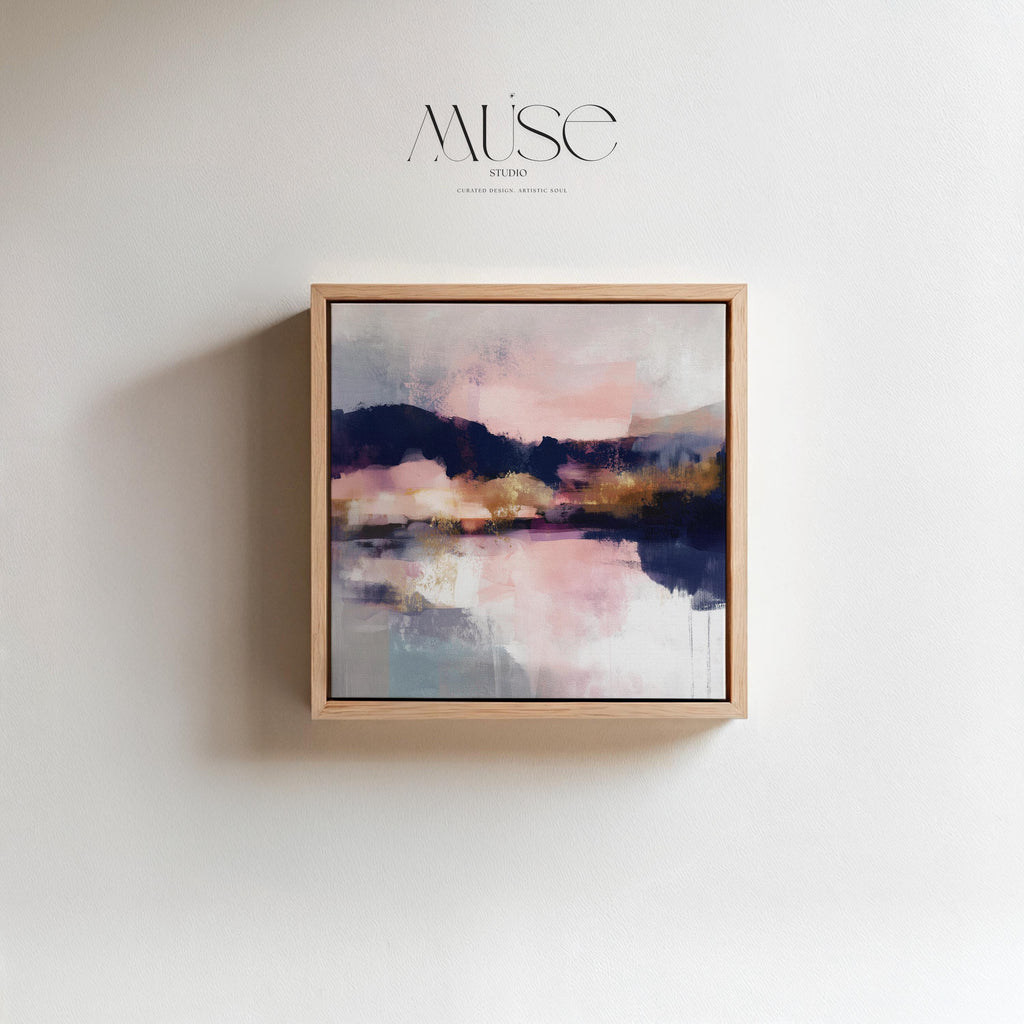 Muse Studio square abstract canvas wall art with pink, gold, and blue tones, museum-grade giclée inks on premium gallery-wrapped artist canvas, set in a floating wood frame, styled for a Soft Contemporary office or entryway interior.
