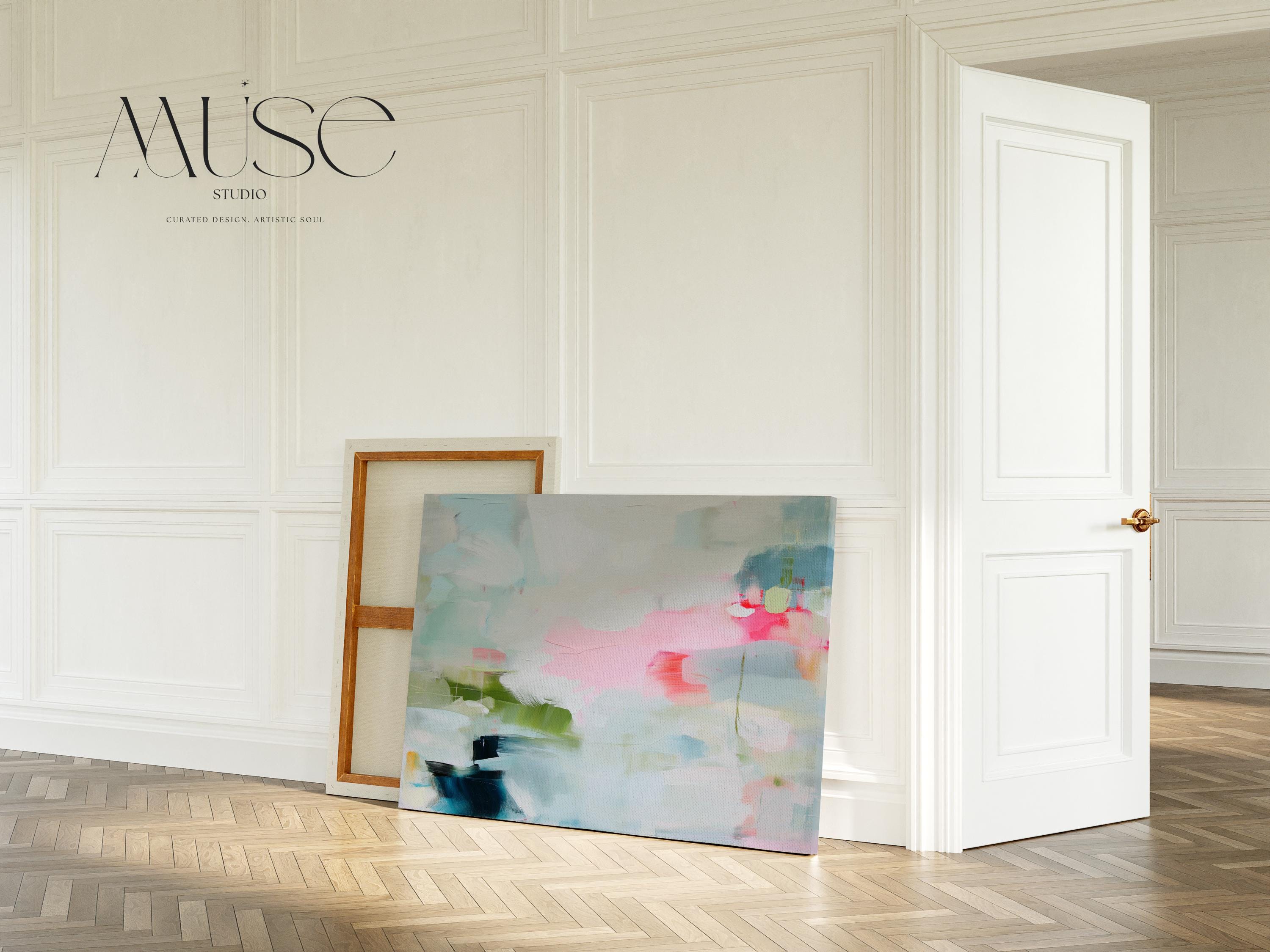 Soft abstract canvas wall art featuring blush pink, sage green, and navy with airy brushstrokes and a serene layout. This large modern artwork suits living rooms, bedrooms, or transitional interiors. Available as a canvas wrap, floating frame, or giclée art print. Available as a fine art poster or canvas wall art for curated, color-forward decor.