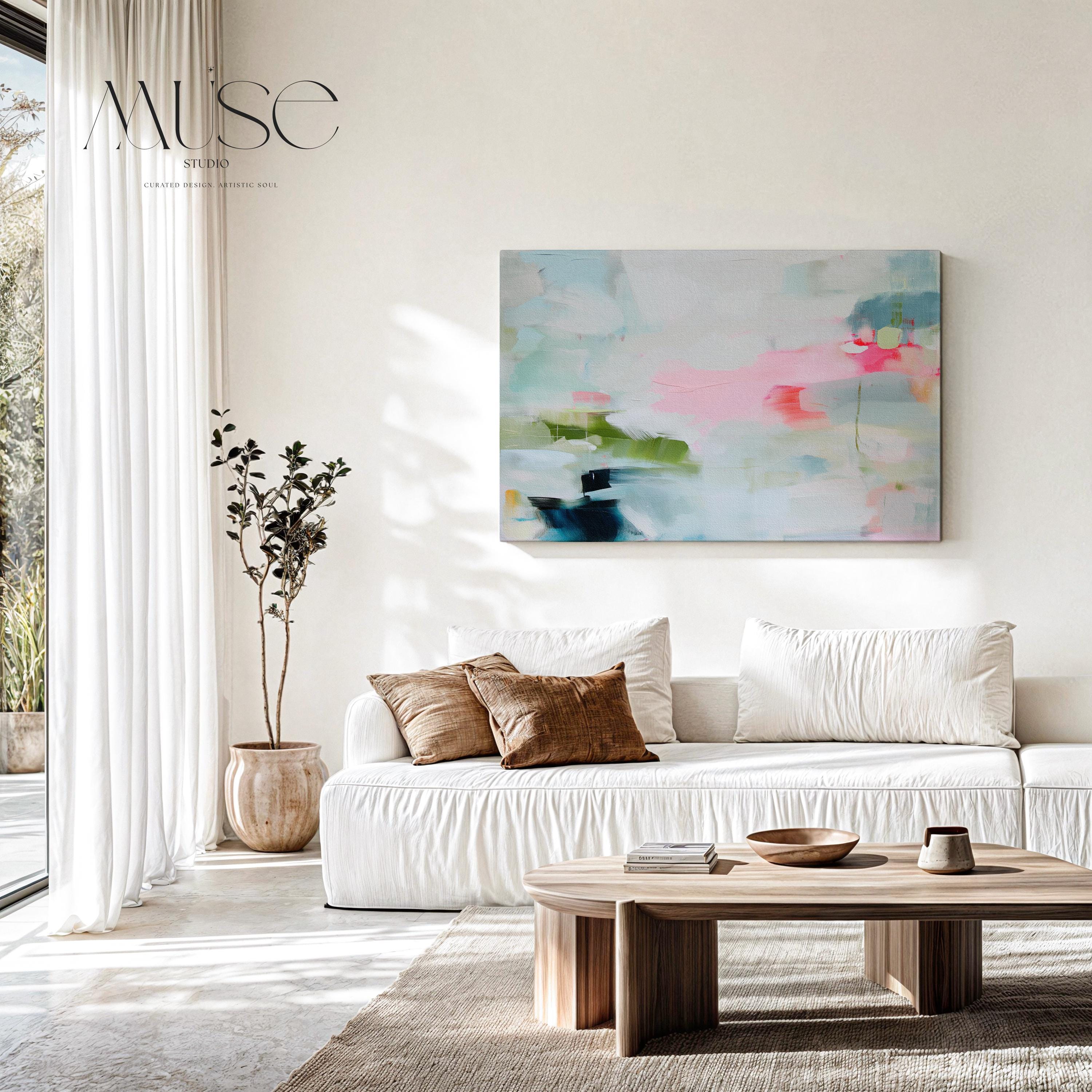 Soft abstract canvas wall art featuring blush pink, sage green, and navy with airy brushstrokes and a serene layout. This large modern artwork suits living rooms, bedrooms, or transitional interiors. Available as a canvas wrap, floating frame, or giclée art print. Available as a fine art poster or canvas wall art for curated, color-forward decor.