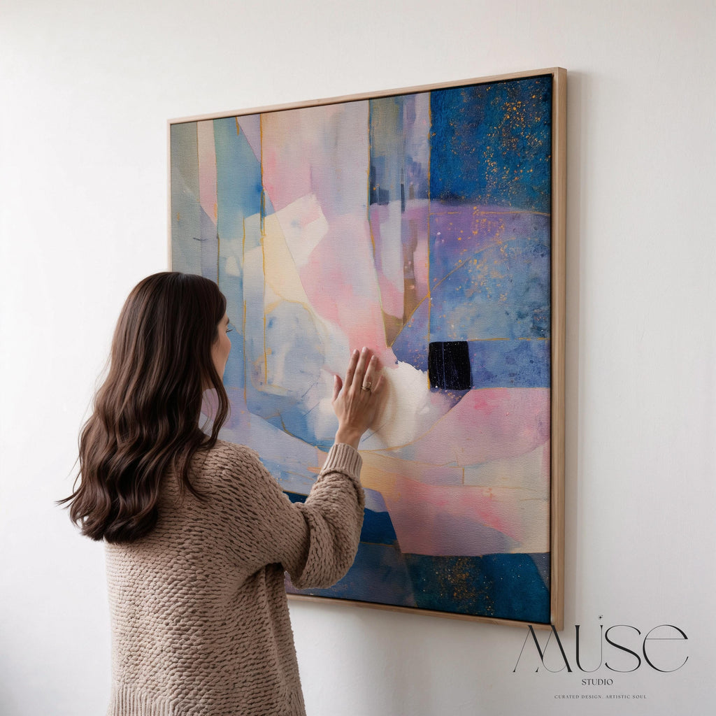 Framed abstract canvas art in soft lavender, blush pink, and deep blue with gold detailing and geometric structure. A dreamy, celestial piece ideal for bedrooms, moody transitional spaces, or modern glam interiors. Available as a framed canvas in multiple finish options for curated, color-forward decor.