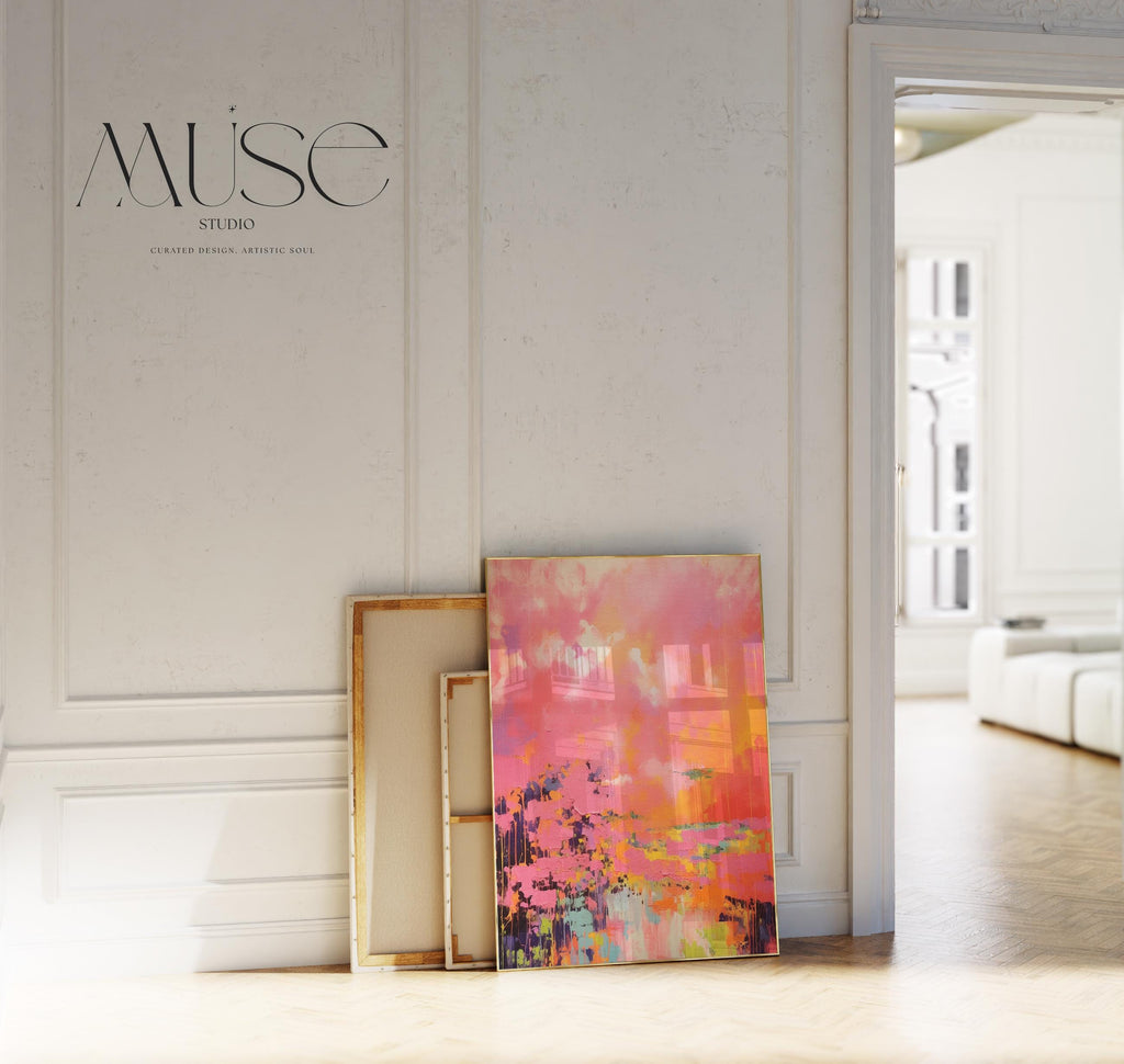 Vertical canvas wall art featuring bold sunset hues of pink, orange, coral, and lavender in a dreamy abstract landscape. Painted in expressive brushwork with glowing color fields, this piece blends beautifully with transitional or boho decor in bedrooms, entryways, or modern curated spaces. Available as a fine art poster or canvas wall art for curated, color-forward decor.