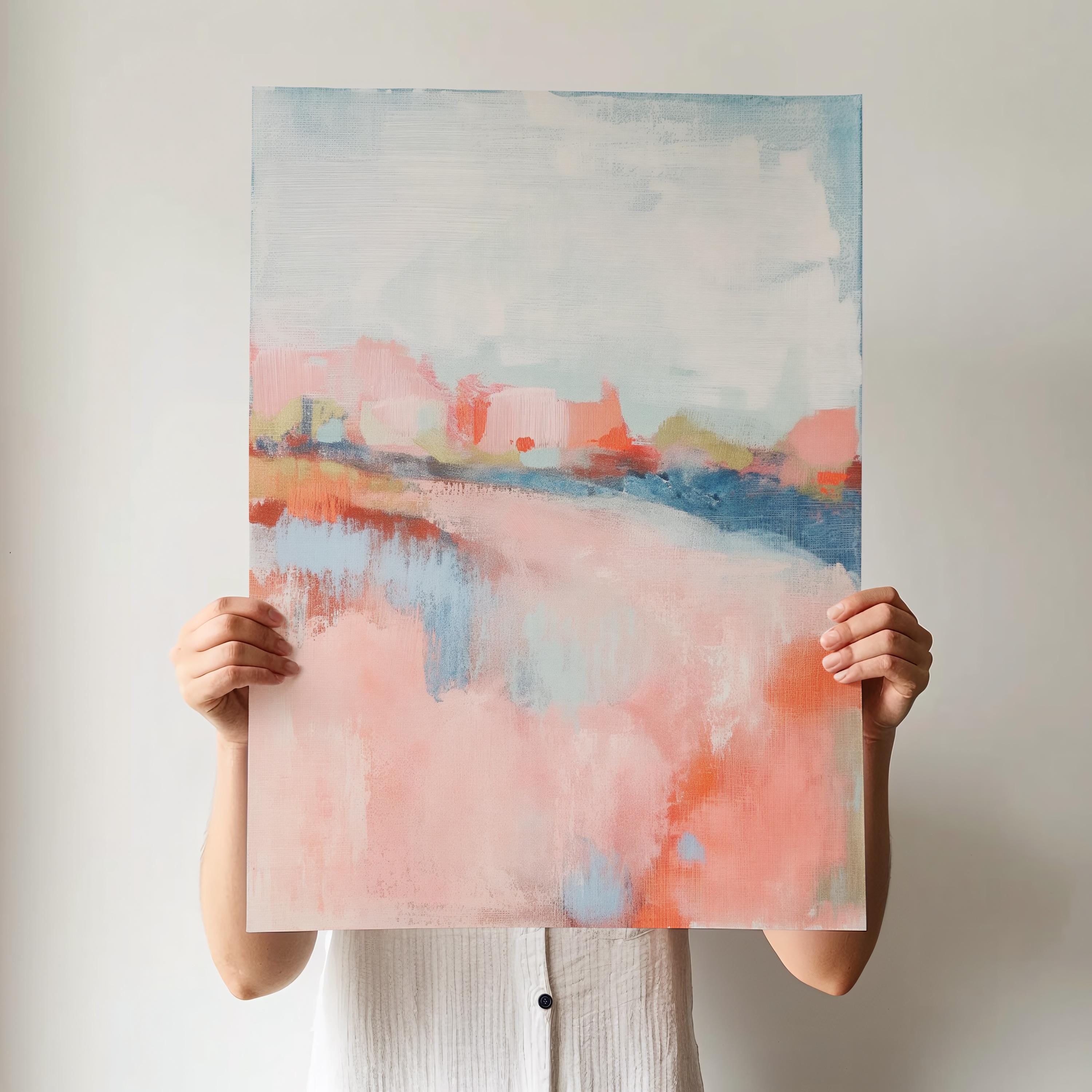 Abstract landscape canvas art featuring coral, soft blush, and blue tones in a peaceful painterly composition. Inspired by nature’s horizon, this vertical piece pairs beautifully with transitional, boho, or serene bedroom decor. Available as a fine art poster or canvas wall art for curated, color-forward decor.