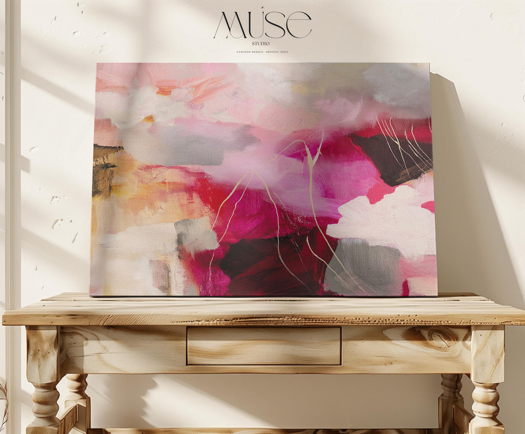 Bold pink and crimson floral abstract canvas with layers of soft blush, terracotta, and warm neutral tones. This horizontal composition adds dramatic energy and romantic warmth to bedrooms, office walls, or layered boho interiors. Available as a fine art poster or canvas wall art for curated, color-forward decor.