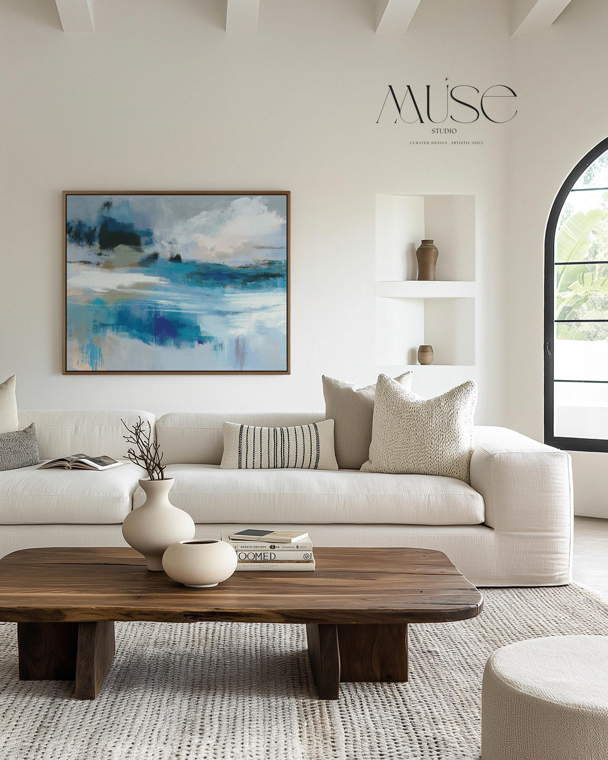 Framed horizontal wall art featuring soft painterly layers of ocean blue, sand beige, and sky tones in a modern coastal abstract. Ideal for beach house living rooms, transitional interiors, or above sofa placement. Available as a fine art poster or canvas wall art for curated, color-forward decor.