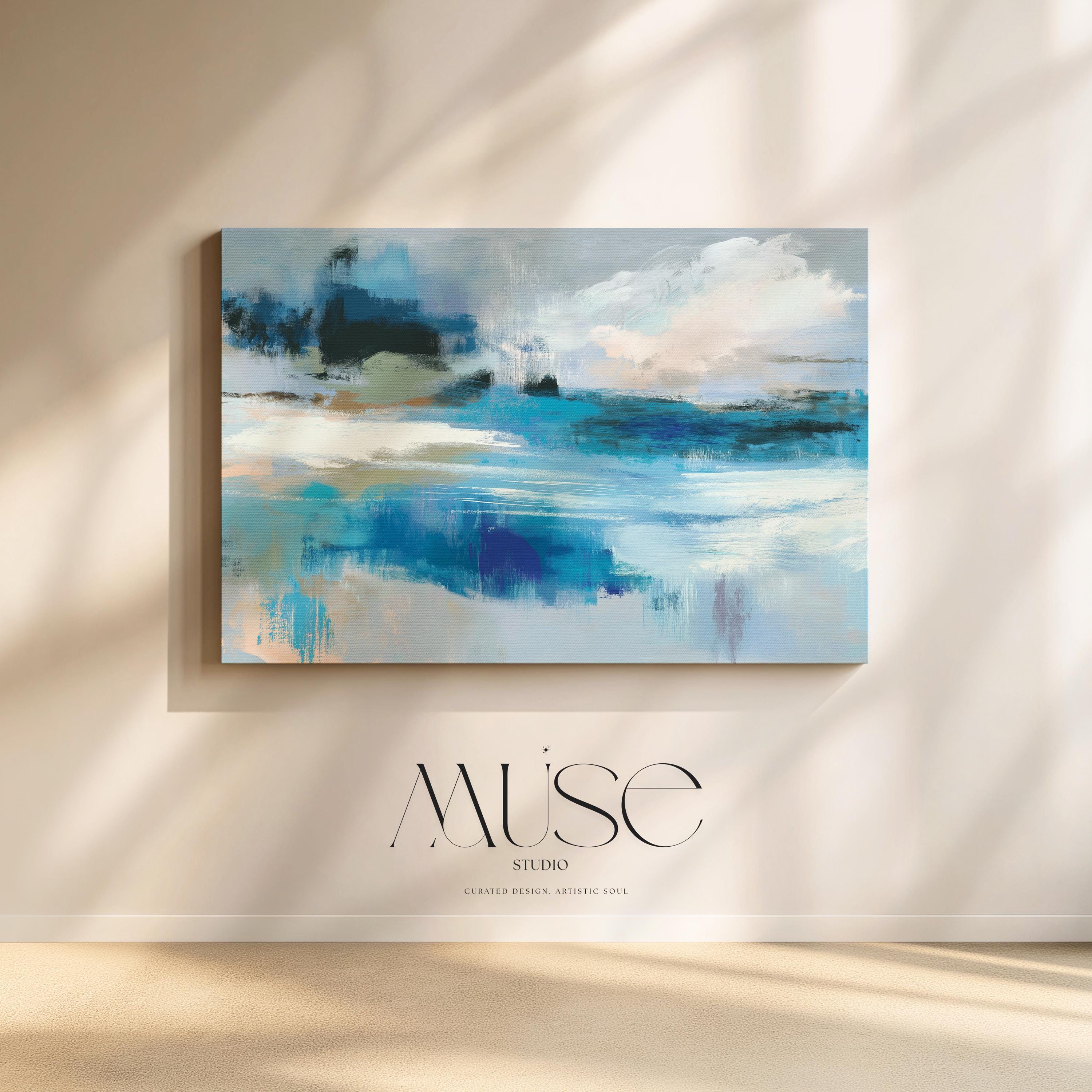 Oversized blue coastal abstract wall art with soft white clouds and ocean-inspired brushstrokes, leaning against paneled walls in a sunlit room. Muted coastal horizon artwork available as framed wall art, canvas, or fine art print by Muse Studio.