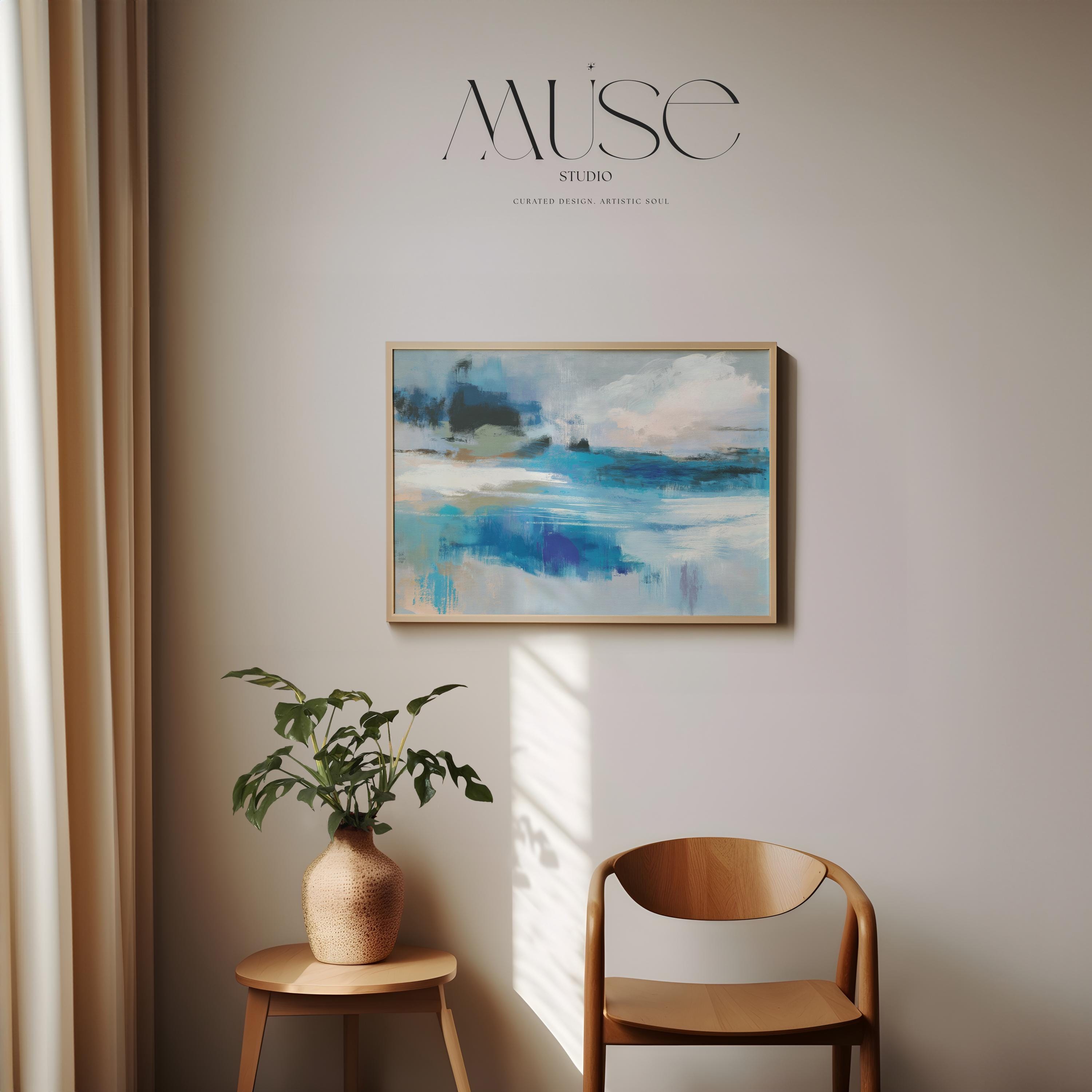 Oversized blue coastal abstract wall art with soft white clouds and ocean-inspired brushstrokes, leaning against paneled walls in a sunlit room. Muted coastal horizon artwork available as framed wall art, canvas, or fine art print by Muse Studio.