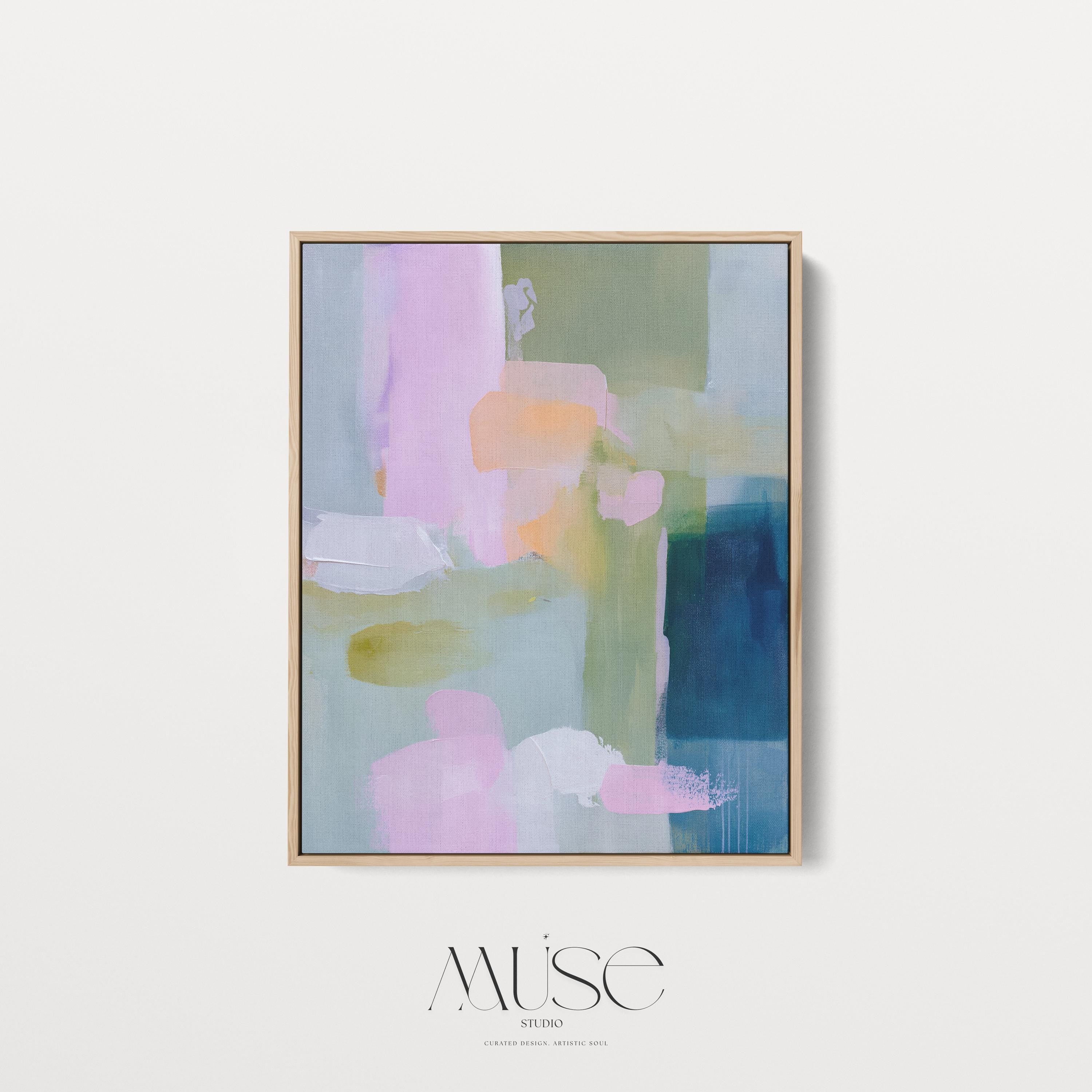 Vertical framed abstract wall art in blush pink, sage green, and coastal blue with layered pastel brushstrokes. A muted modern and soft contemporary design perfect for living rooms, entryways, or bedrooms. Displayed in a premium floating wood frame for a refined finish. Available as XL framed wall art by Muse Studio.