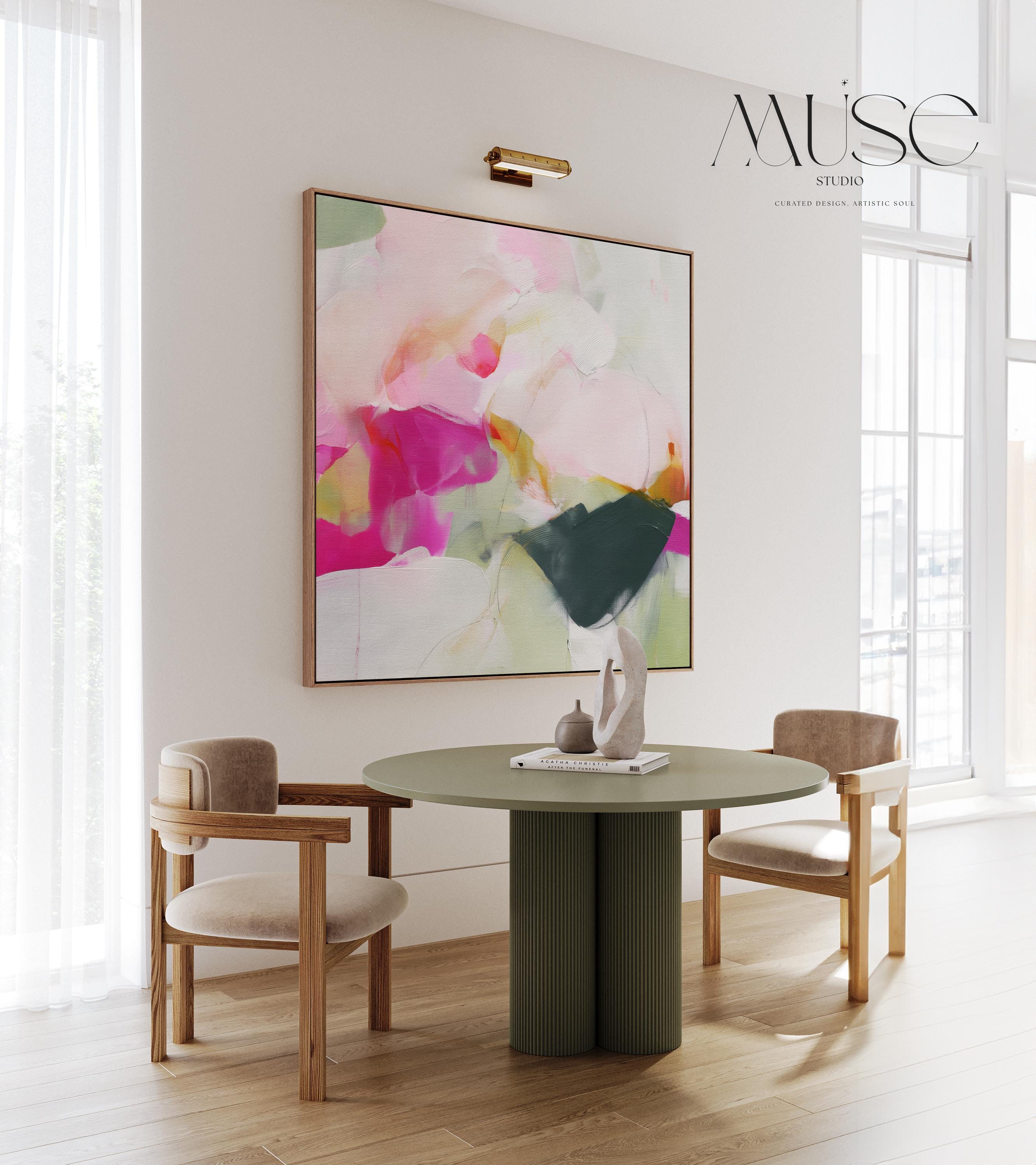Muse Studio framed floral wall art featuring a pink and green minimalist abstract composition with blush, cream, sage, soft white, and deep charcoal tones. Square framed canvas artwork with romantic botanical movement, museum-grade giclée inks, premium cotton canvas, and custom wood float frame options, styled for living room, bedroom, office, dining room, or soft contemporary interiors.