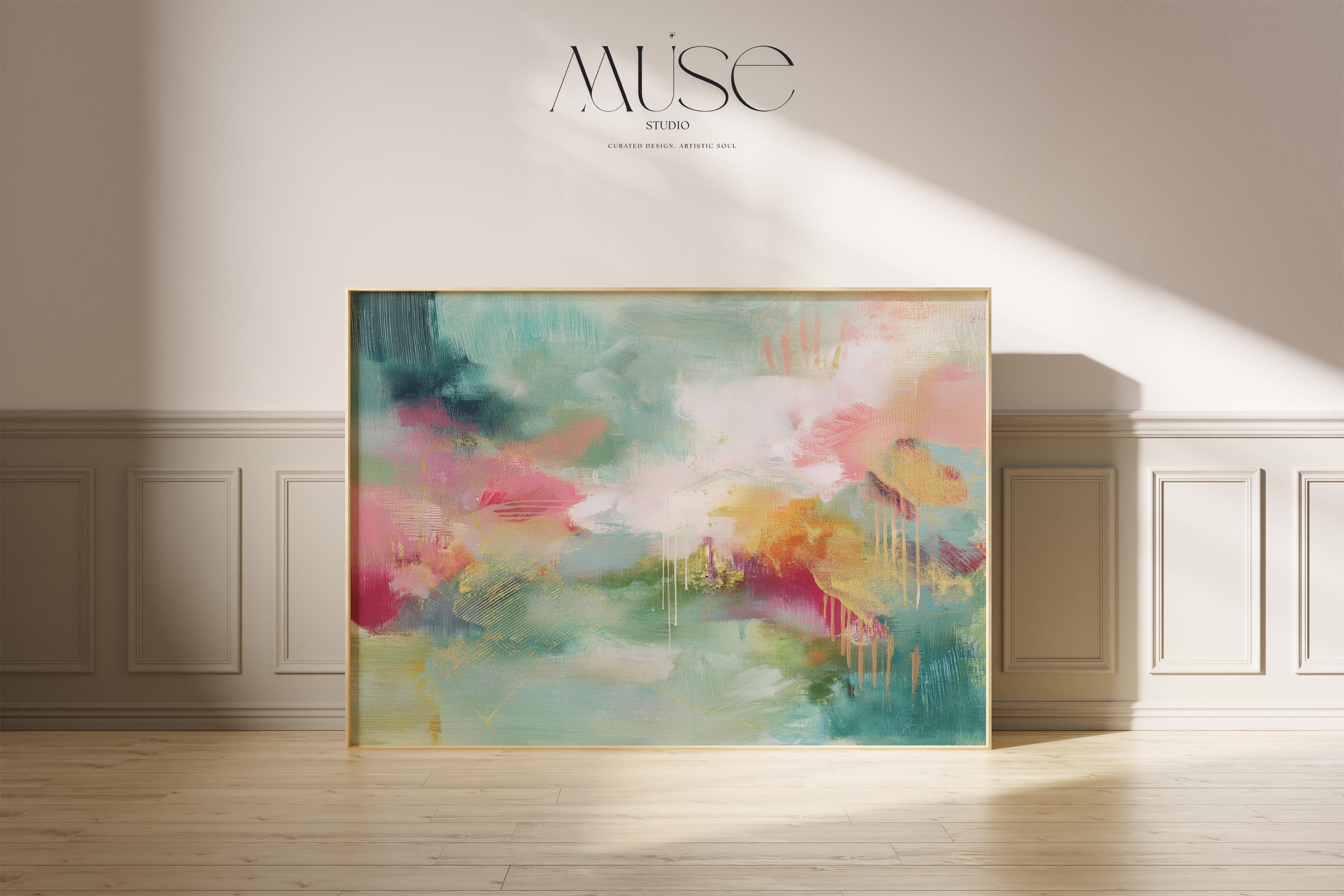 Horizontal abstract canvas wall art with bold teal, soft coral, and golden accents, framed in a warm neutral room. Designed with expressive brushstrokes and rich color layering, this extra-large piece brings eclectic and transitional style to living rooms, dining spaces, or modern interiors. Available as framed or gallery-wrapped canvas from Muse Studio.