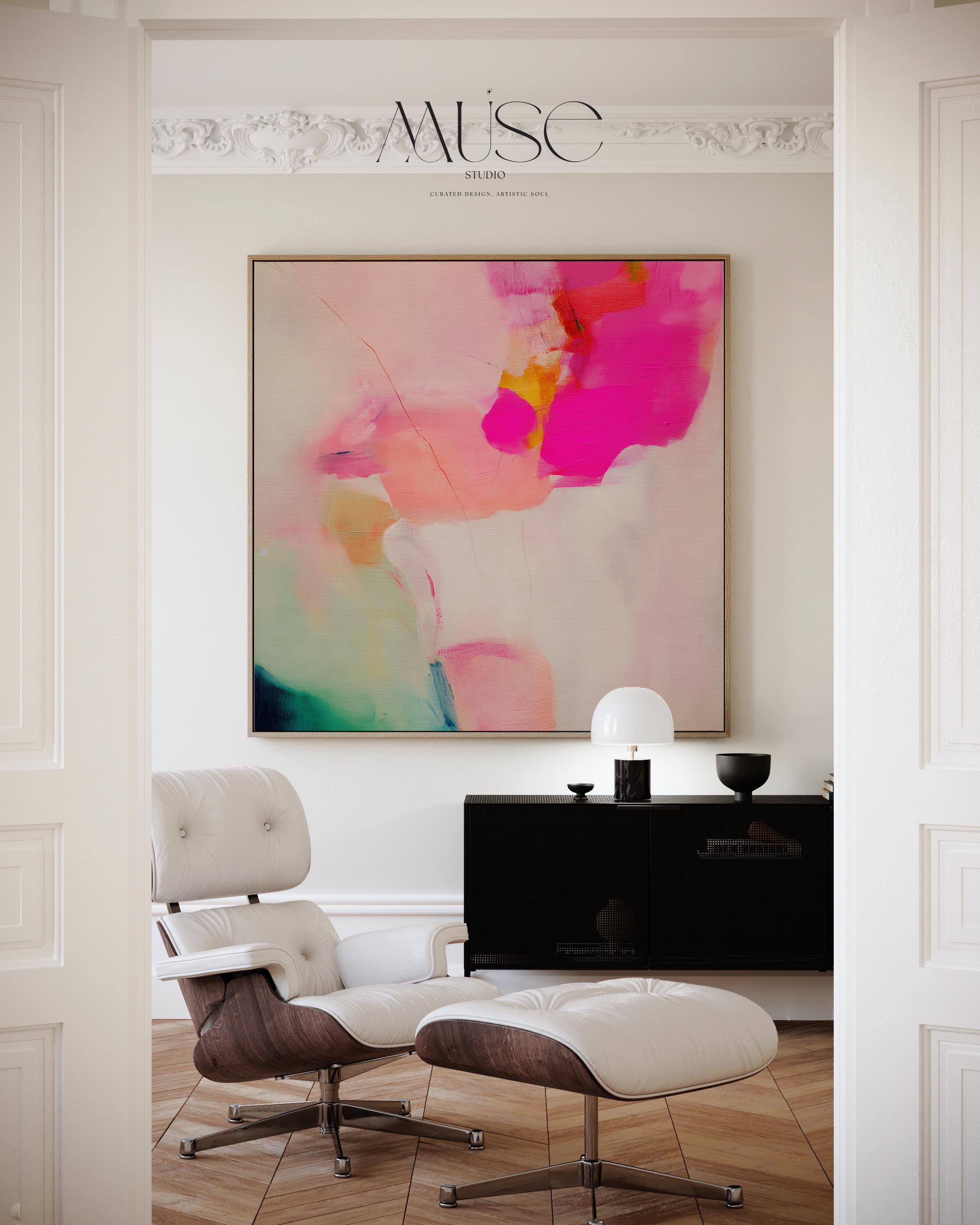 Framed canvas wall art featuring bold fuchsia pink, blush, coral, and aqua teal tones in a square abstract giclée print. Designed as a statement piece for dining rooms, living rooms, or bedrooms, this artwork blends transitional and contemporary boho style with vibrant sophistication. Available as a floating framed canvas giclée print in multiple sizes, perfect for curated designer-inspired home decor.