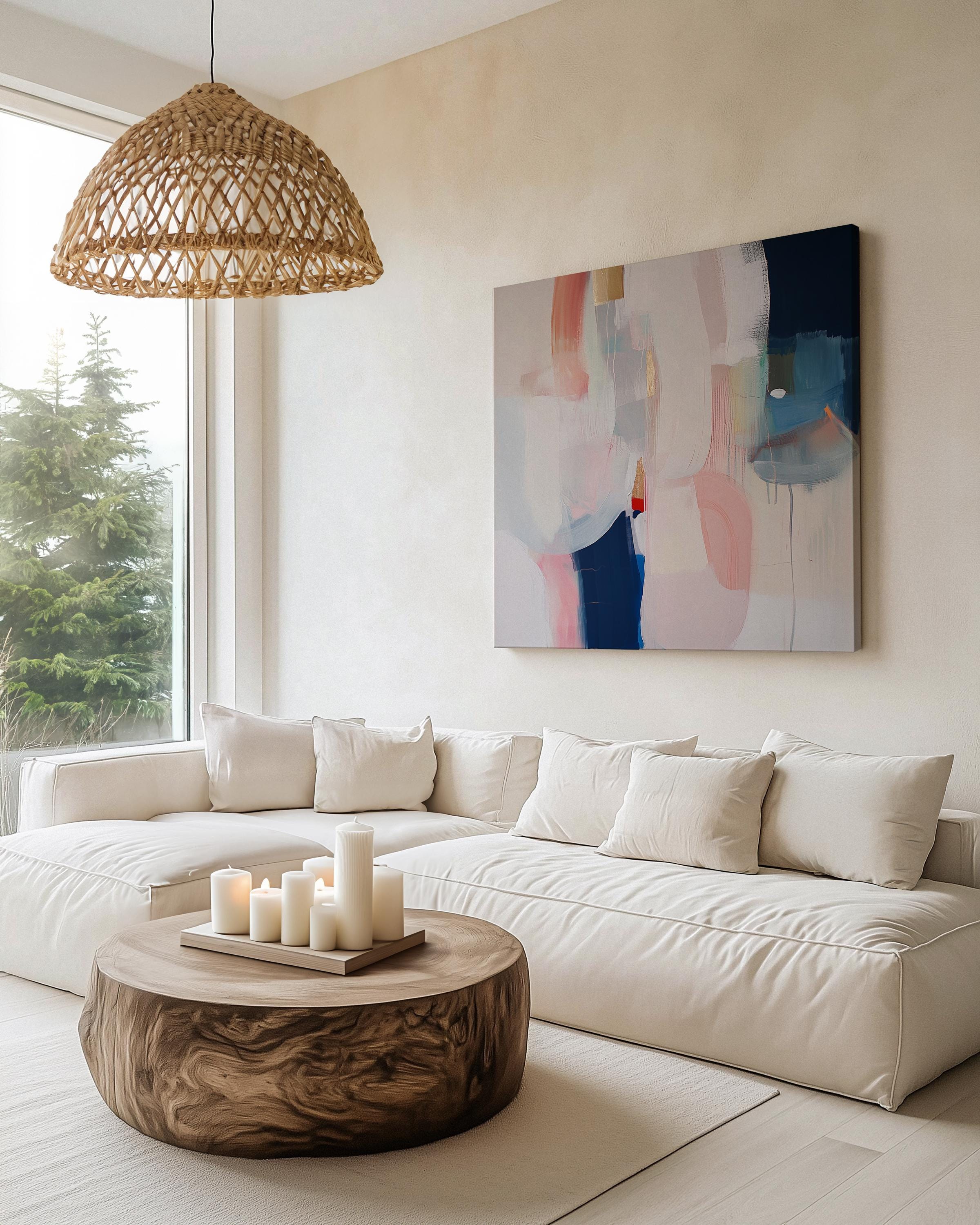 Large abstract wall art canvas and giclée print featuring beige, blush, ivory, muted blue, and earthy tones. Designed in a muted neutral palette with warm minimalist charm, this artwork creates a serene yet refined statement for living rooms, bedrooms, or entryways. Square format blends soft contemporary style with timeless elegance. Available as a gallery-wrapped canvas or fine art giclée print for curated designer interiors.