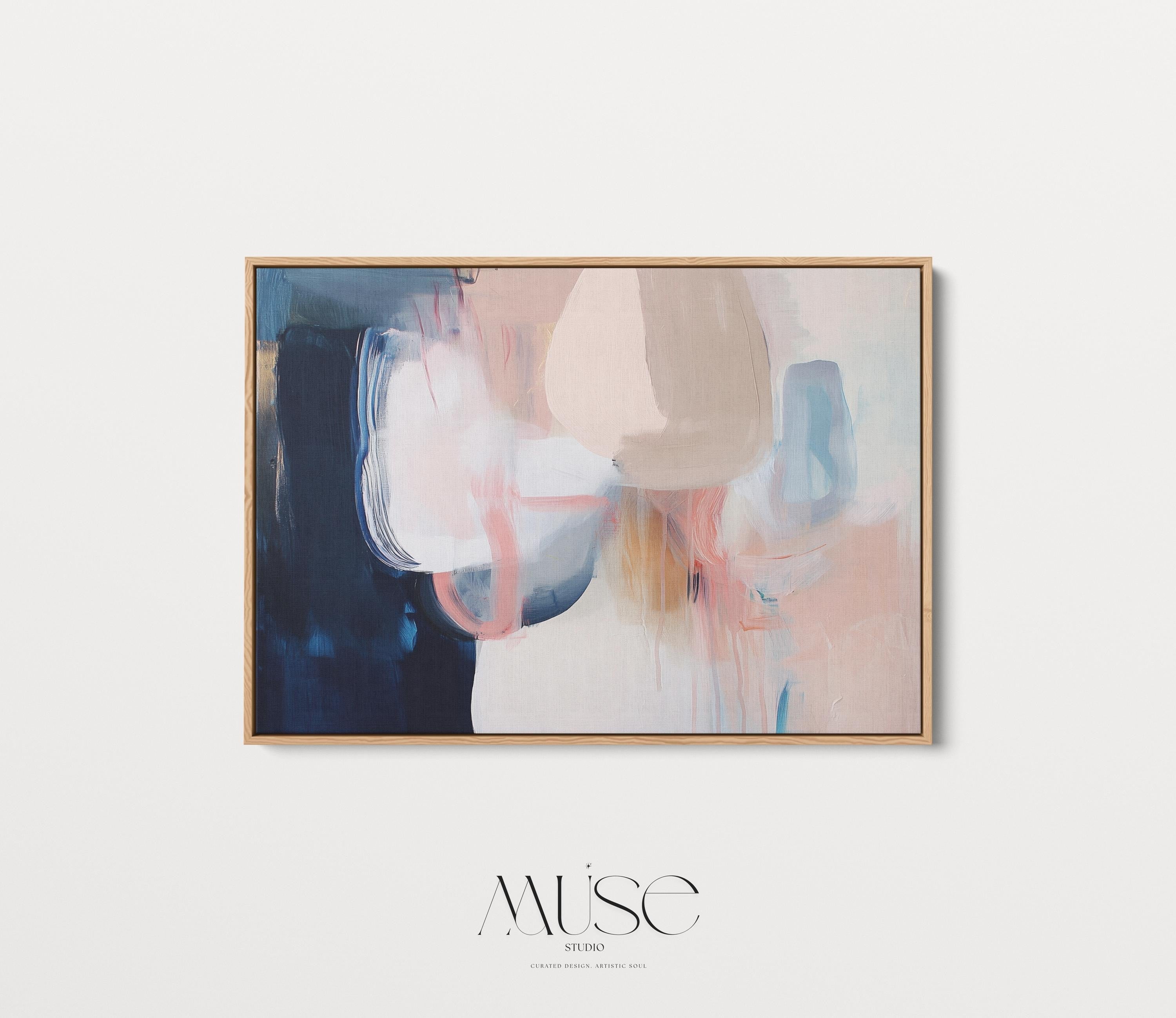 Large framed canvas wall art featuring blush, peach, ivory, muted blue, and navy tones in a horizontal abstract giclée print. Designed in muted neutral style with transitional and soft contemporary appeal, this artwork is perfect for living rooms, dining rooms, or bedrooms. Its calming palette and painterly textures bring balance and elegance to interiors. Available as a floating framed canvas giclée print in multiple large sizes.