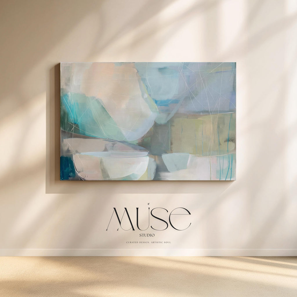 Horizontal abstract wall art in soft blue, aqua, and muted neutral tones displayed on a sunlit wall. Large modern canvas painting with pastel contemporary brushwork, ideal for living room, bedroom, or designer interior spaces. Available as a large canvas wall art print by Muse Studio.