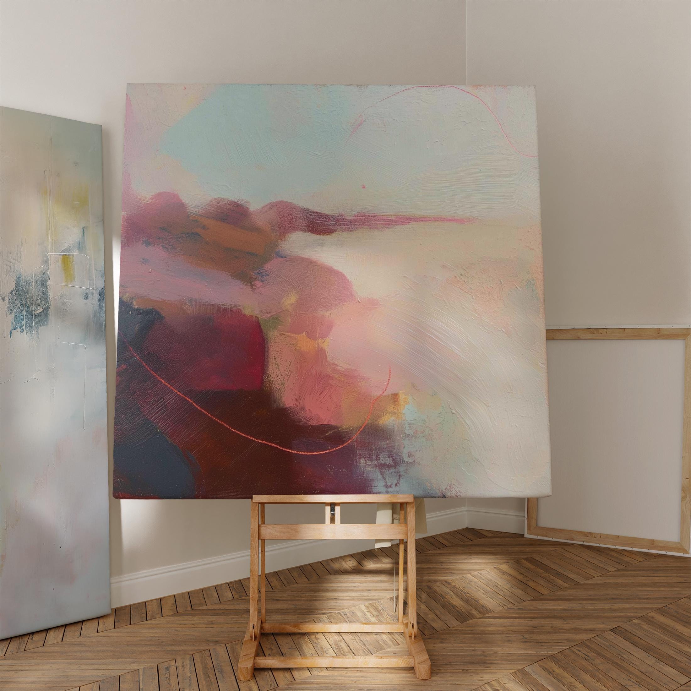 Square abstract canvas wall art featuring soft blush, terracotta, and cream tones with layered painterly textures and horizon-inspired flow. This warm minimal giclée print blends natural earth tones with serene modern design, ideal for living rooms or transitional spaces. Available as gallery-wrapped canvas or floating frame canvas from Muse Studio.