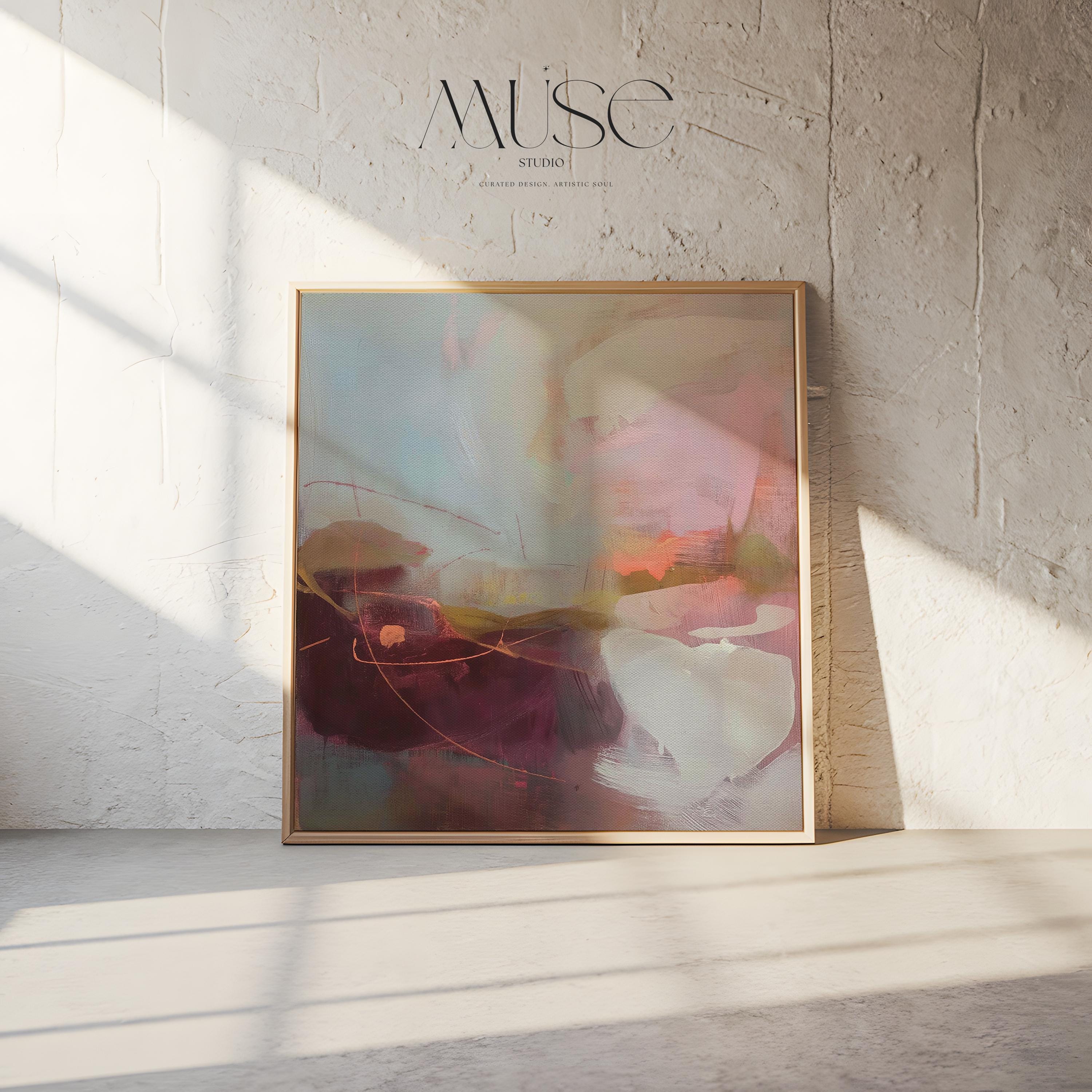 Square framed canvas wall art featuring plum, blush, and warm sand tones with expressive abstract strokes and fluid linework. Inspired by nature and styled for warm minimal interiors, this piece is perfect for dining rooms, entryways, or serene contemporary spaces. Fine art giclée by Muse Studio, available as a floating framed canvas or unframed option.