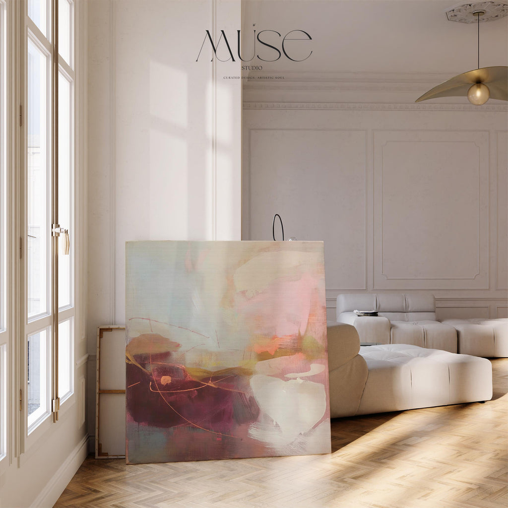 Square abstract canvas wall art featuring a blend of plum, blush pink, peach, and warm neutrals with soft textures and expressive linework. Styled in a nature-inspired and warm minimal aesthetic, this giclée canvas adds elegant calm to dining rooms, entryways, or serene modern interiors. Available as gallery-wrapped or framed canvas from Muse Studio.