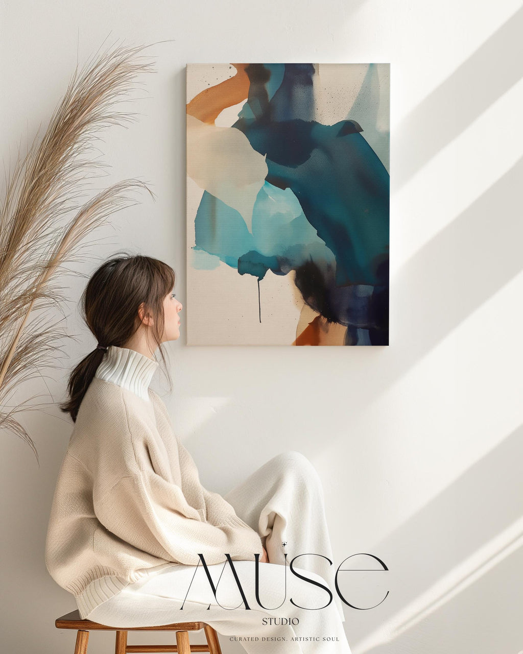 Vertical gallery-wrapped canvas featuring an abstract composition of teal, deep navy, soft aqua, and sand with fluid, ink-like motion across a neutral base. This nature-inspired wall art adds a tranquil, contemporary presence to coastal interiors, entryways, or stairwells. A soft modern statement piece, available as canvas or floating framed wall art from Muse Studio.