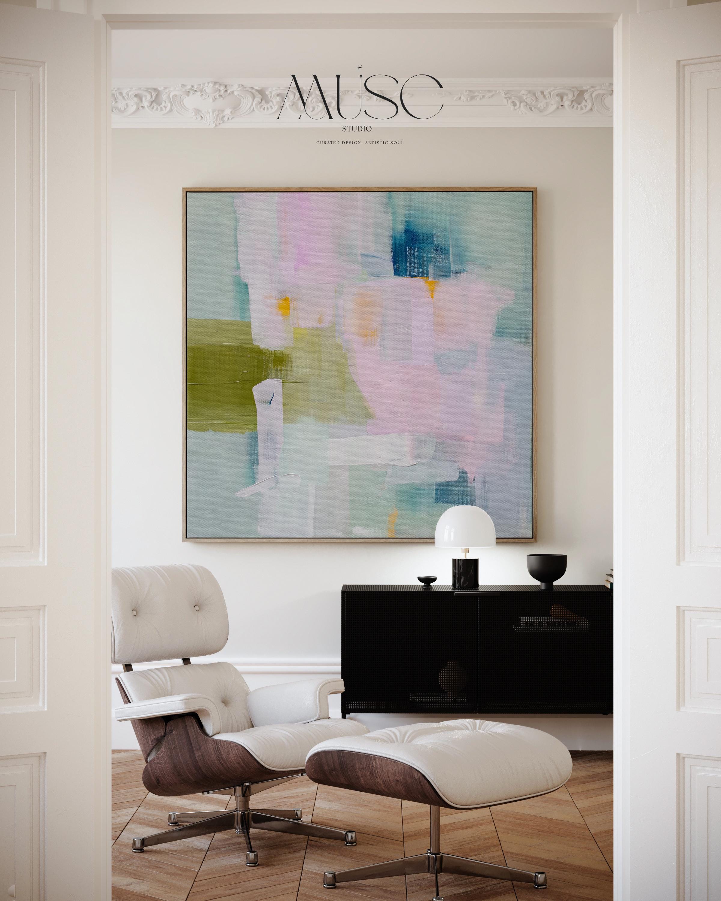 Framed abstract wall art in blush pink, sage green, and soft blue, painted with layered brushstrokes in a muted modern style. Perfect for soft contemporary interiors, dreamy bedrooms, or large living room walls. Displayed in a premium floating wood frame. Available as a framed canvas wall art piece for designer-inspired home decor.