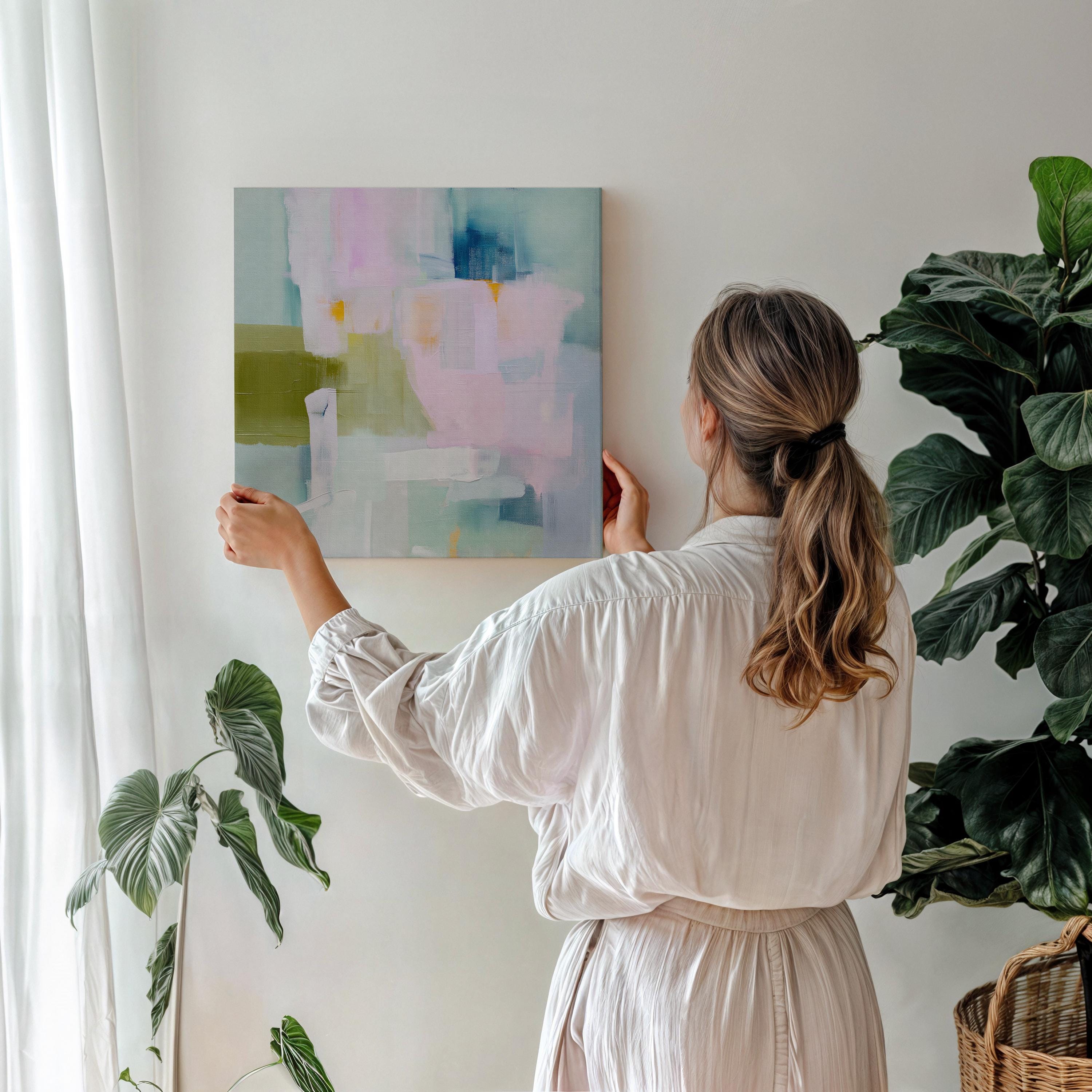 Soft pastel abstract canvas wall art in blush pink, sage green, and sky blue, painted with layered brushstrokes for a muted modern aesthetic. Perfect for soft contemporary interiors, dreamy bedrooms, or large living room walls. Gallery-wrapped on 1.5” wooden frame for a seamless modern finish. Available as extra large canvas wall art by Muse Studio.