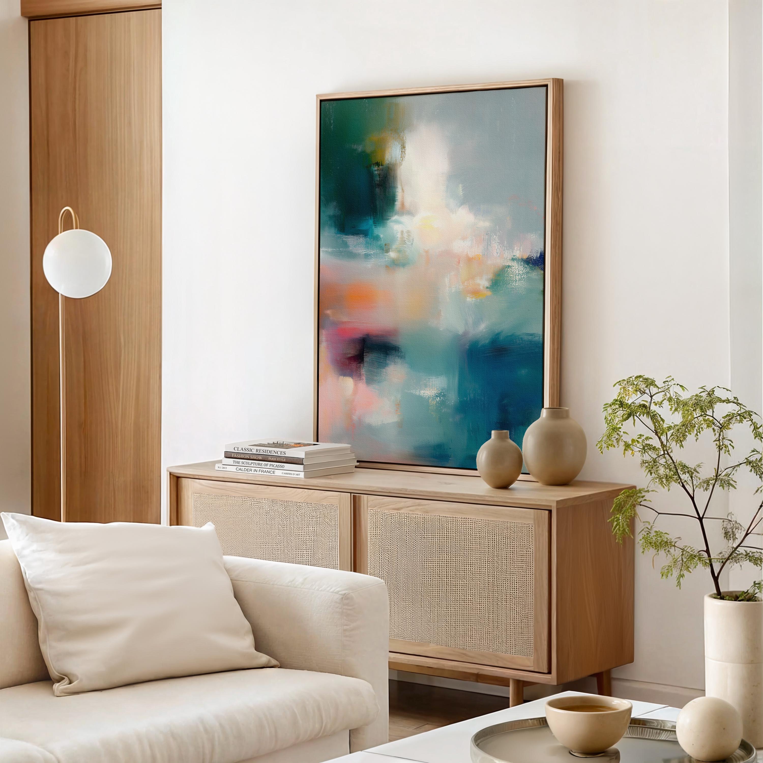 Vertical abstract canvas wall art featuring teal, coral, blush, and warm tones blended in painterly textures. Contemporary large artwork framed in wood, perfect for living room, bedroom, or office statement decor. Designed to suit transitional, modern, and soft contemporary interiors. Available as canvas wall art, framed canvas, or fine art print.