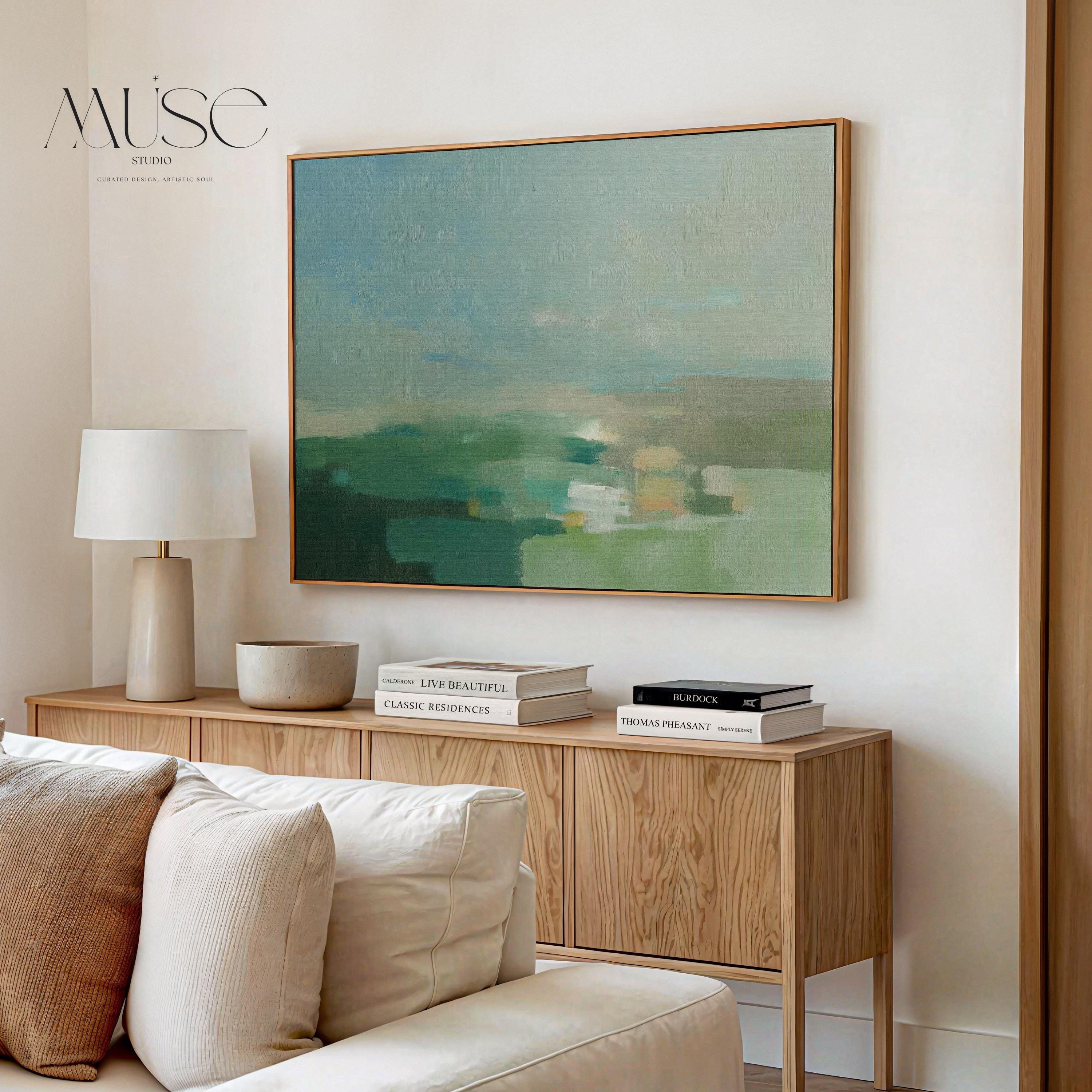 Horizontal abstract wall art in green, aqua, and muted blue tones, styled as a soft nature-inspired landscape. Perfect for warm minimalist, transitional, and serene interiors such as living rooms, dining spaces, or entryways. Available as gallery-wrapped canvas, framed canvas, or fine art print.