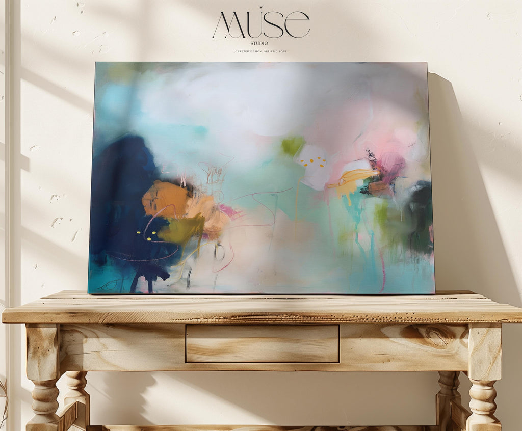 Horizontal abstract wall art with pink, teal, and mustard brushstrokes. Contemporary canvas painting designed as a colorful statement piece for living rooms, dining areas, or offices. Available as a gallery-wrapped or framed canvas for curated, designer-forward home decor.