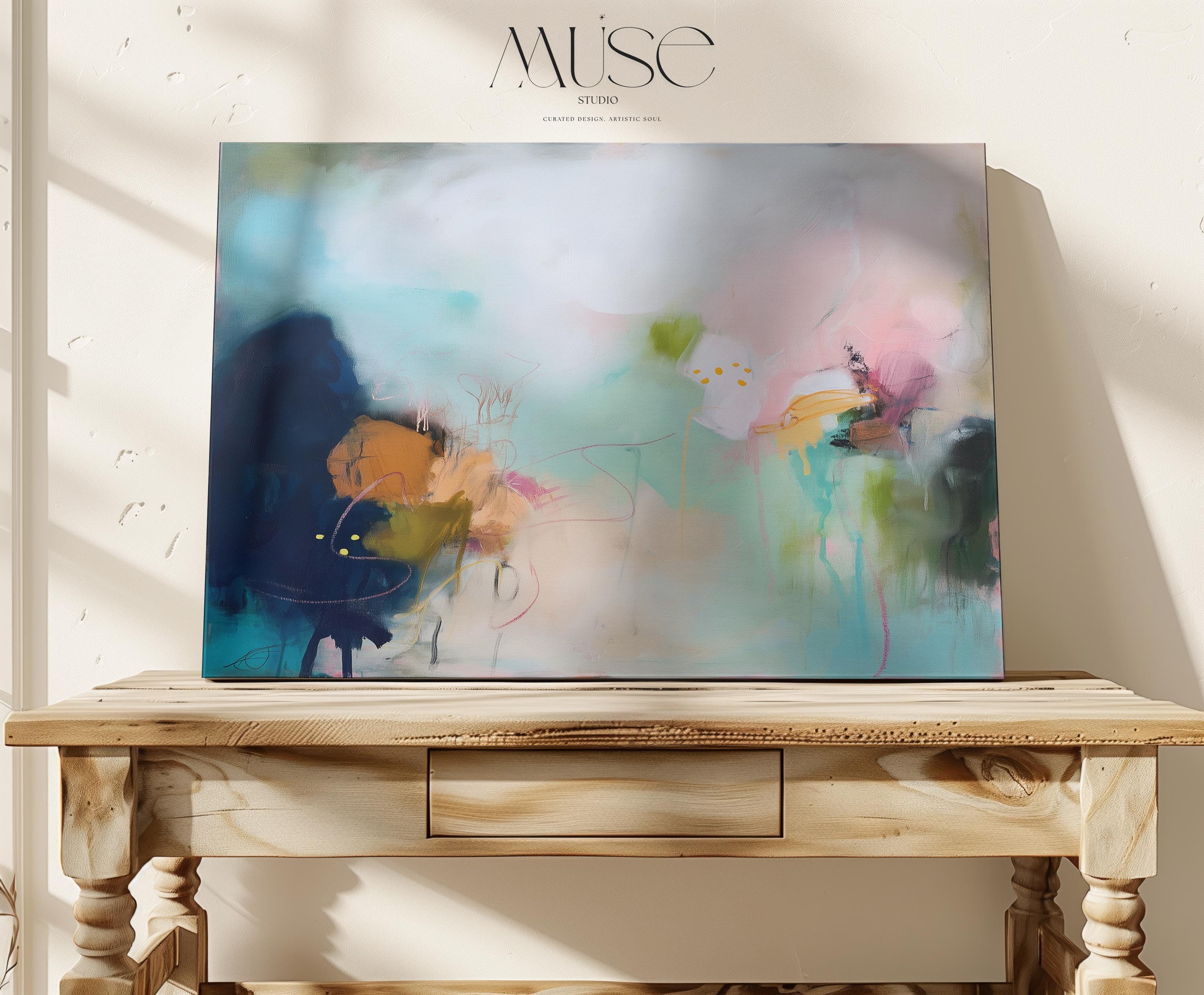 Horizontal abstract wall art with pink, teal, and mustard brushstrokes. Contemporary canvas painting designed as a colorful statement piece for living rooms, dining areas, or offices. Available as a gallery-wrapped or framed canvas for curated, designer-forward home decor.