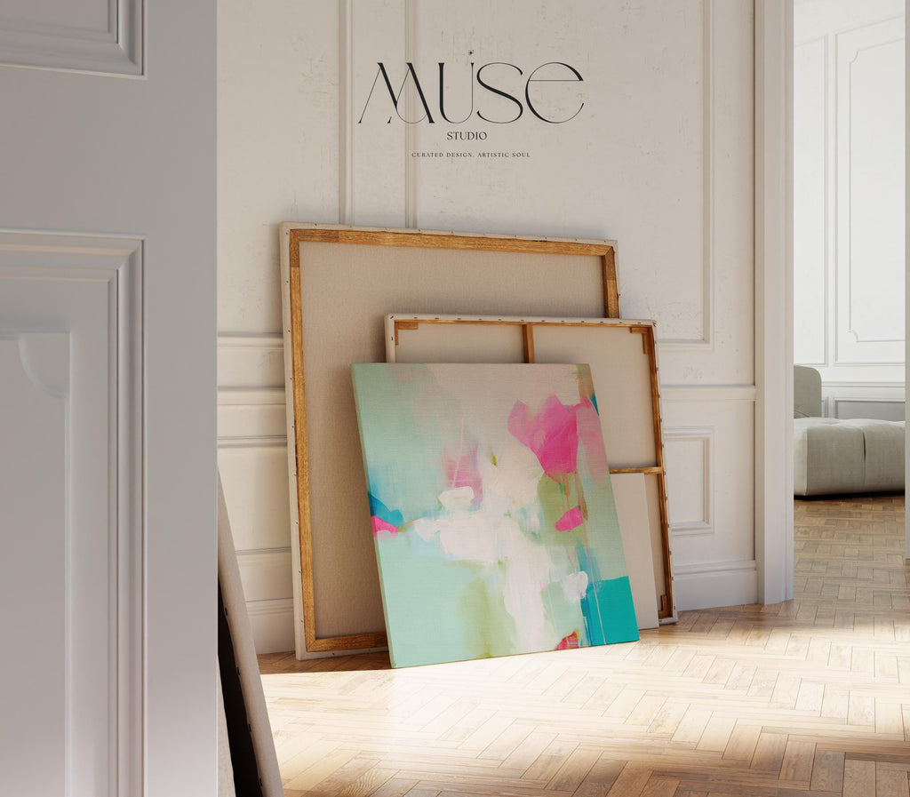 Square abstract wall art on canvas featuring aqua blue, blush pink, and soft white tones in a painterly pastel style. Designed for preppy and soft contemporary interiors, this large framed artwork brings an airy yet vibrant mood to bedrooms, nurseries, or living rooms. Available as a gallery-wrapped or framed canvas for curated designer decor.
