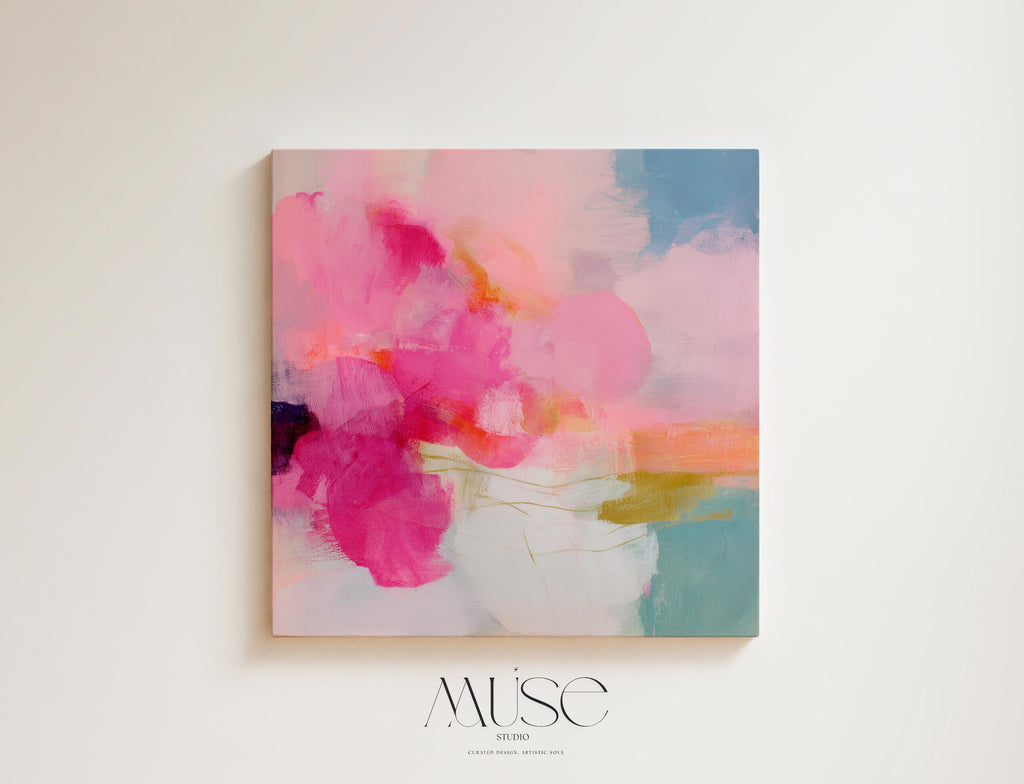Square abstract canvas wall art featuring vivid pink, coral, and golden brushstrokes against a soft backdrop. Bold yet refined, this statement artwork suits transitional, boho, and soft contemporary interiors. Perfect for bedrooms, living rooms, or entryway decor. Available as framed or gallery-wrapped canvas.