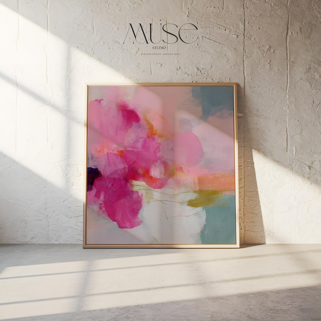 Framed square canvas wall art featuring bold pink and coral brushstrokes with teal and golden undertones. This abstract artwork blends boho, transitional, and soft contemporary design, perfect for bedrooms, living rooms, or entryway decor. Available as framed or gallery-wrapped canvas.
