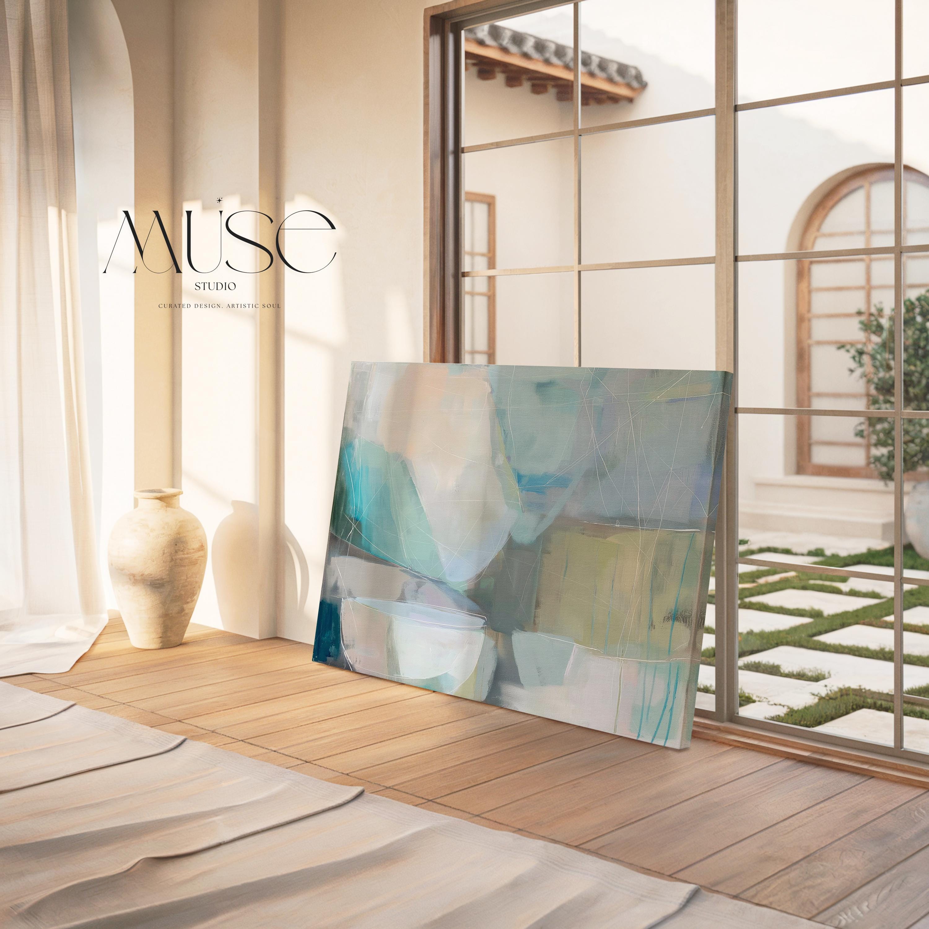 Horizontal abstract wall art in soft blue, aqua, and muted neutral tones displayed on a sunlit wall. Large modern canvas painting with pastel contemporary brushwork, ideal for living room, bedroom, or designer interior spaces. Available as a large canvas wall art print by Muse Studio.