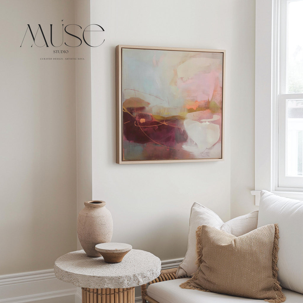 Square framed canvas wall art featuring plum, blush, and warm sand tones with expressive abstract strokes and fluid linework. Inspired by nature and styled for warm minimal interiors, this piece is perfect for dining rooms, entryways, or serene contemporary spaces. Fine art giclée by Muse Studio, available as a floating framed canvas or unframed option.