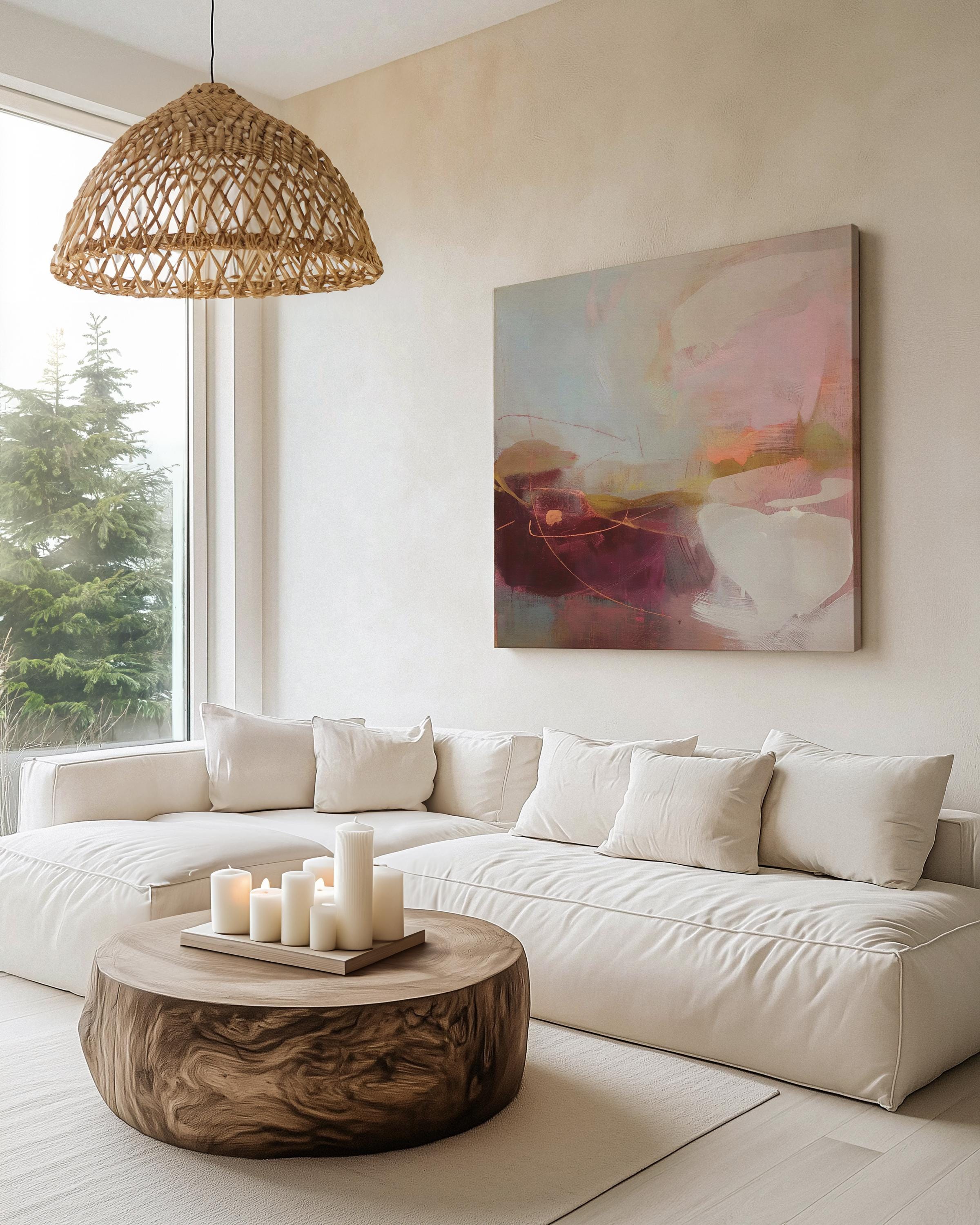 Square abstract canvas wall art featuring a blend of plum, blush pink, peach, and warm neutrals with soft textures and expressive linework. Styled in a nature-inspired and warm minimal aesthetic, this giclée canvas adds elegant calm to dining rooms, entryways, or serene modern interiors. Available as gallery-wrapped or framed canvas from Muse Studio.