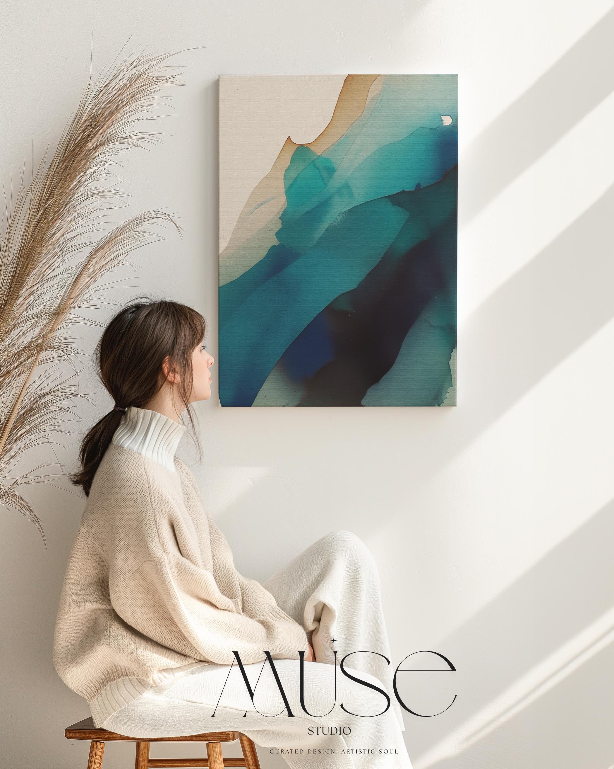 Vertical canvas wall art featuring deep teal, navy, aqua, and soft sand tones in a fluid, ink-wash abstract style. This nature-inspired design blends organic motion with a tranquil, modern aesthetic—perfect for soft contemporary interiors, stairwells, or coastal-inspired living rooms. Available as a gallery-wrapped or floating frame canvas from Muse Studio for designer-level wall styling.