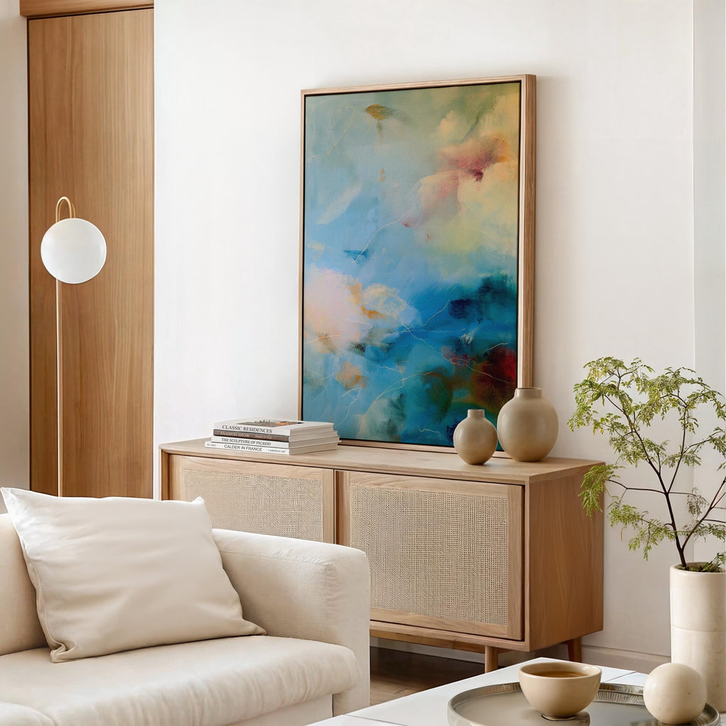 Vertical teal blue abstract canvas wall art by Muse Studio, artwork 549. Serene coastal-inspired painting in teal, soft blue, and warm neutral tones printed with museum-grade giclée inks on premium gallery-wrapped artist canvas, styled for spa bathrooms, calm entryways, and modern coastal interiors.