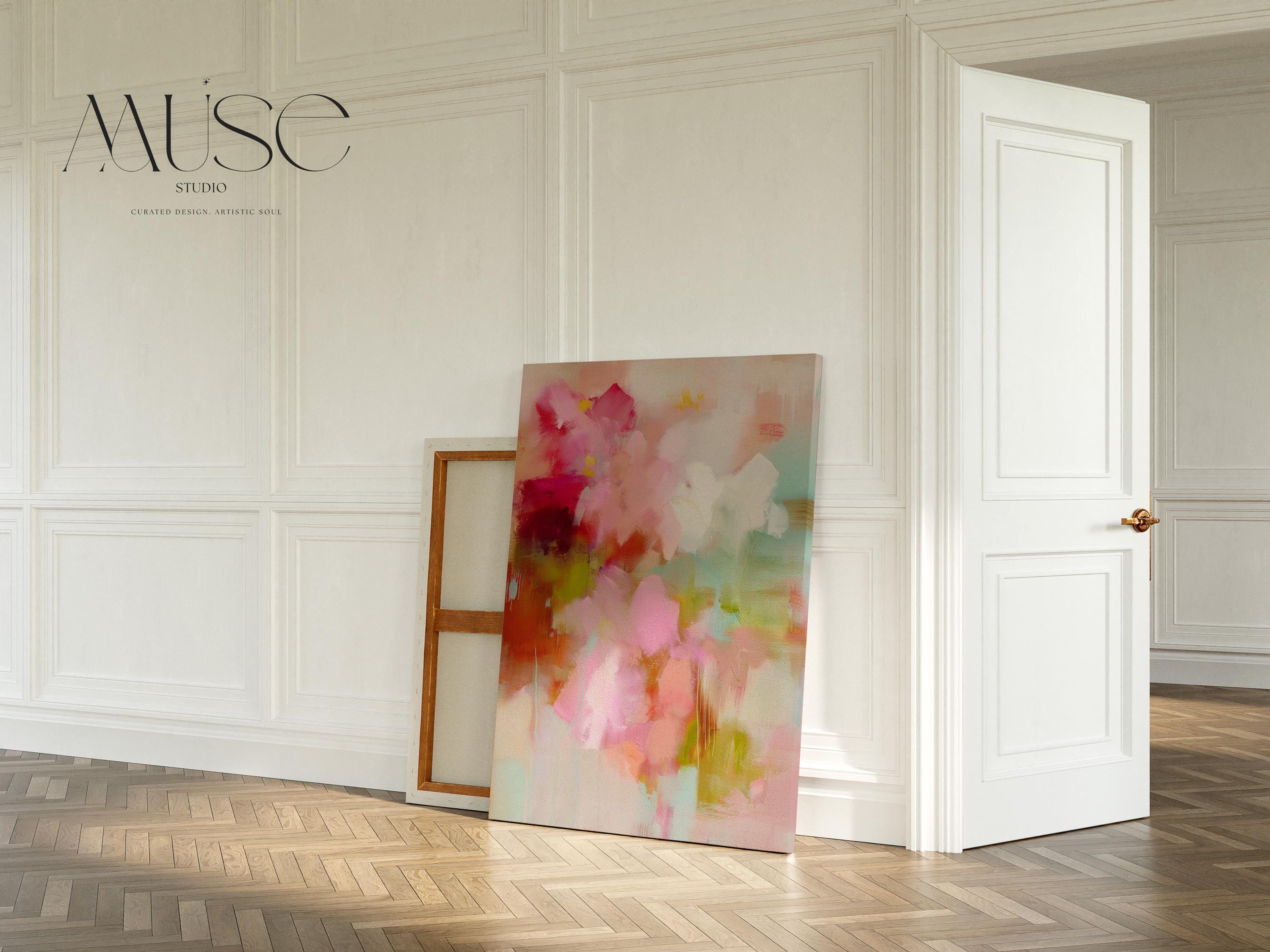 Large vertical abstract canvas wall art featuring blush pink, coral, and mint green tones in a pastel botanical style. Designed as a giclée print, this artwork evokes spring freshness and painterly movement, perfect for bedrooms, living rooms, or entryways. Its oversized format creates a bright, uplifting focal point. Available as a gallery-wrapped large canvas giclée print in multiple sizes for curated, designer-inspired interiors.