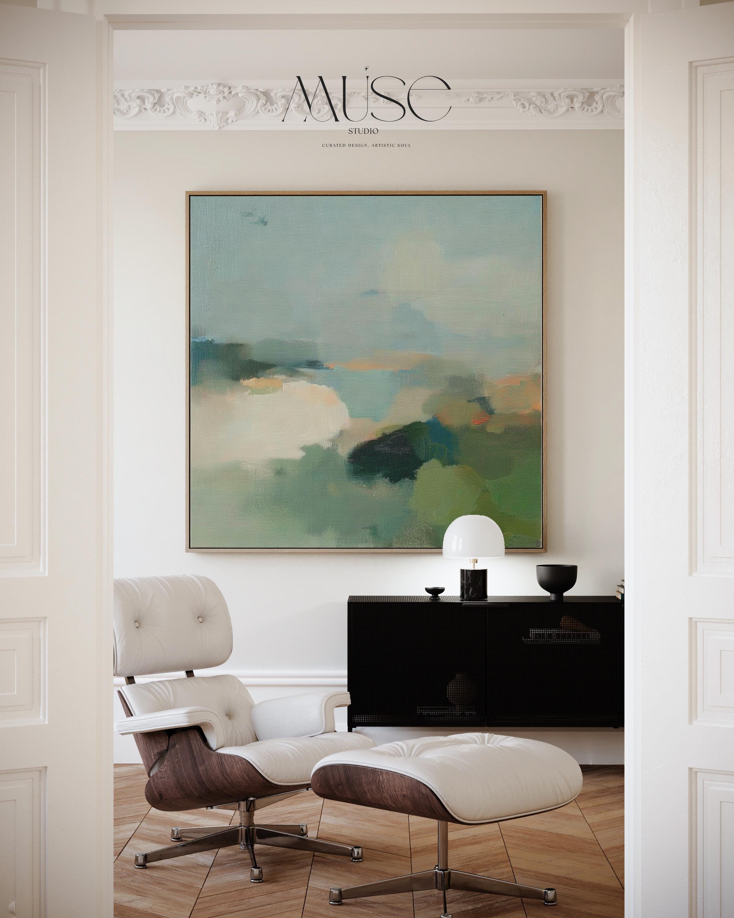 Square abstract wall art in sage green, soft blue, and muted neutrals with horizon-inspired brushstrokes. Large calming canvas decor designed for living rooms, bedrooms, or entryways. Styled for soft contemporary and nature-inspired interiors, perfect as a statement piece. Available as gallery-wrapped canvas, framed canvas, or fine art print.