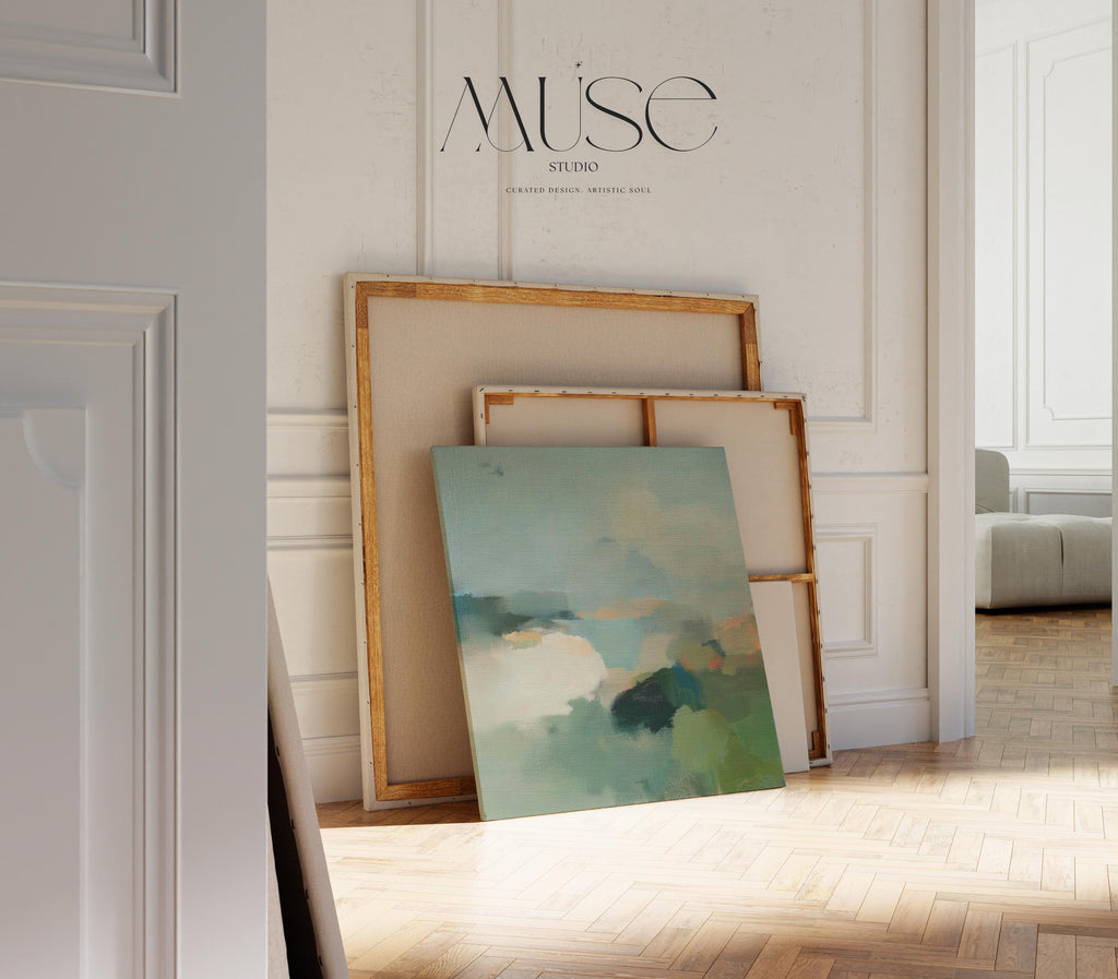Square abstract wall art in soft greens, muted blues, and earthy tones with a horizon-inspired design. Large canvas artwork styled for modern interiors, perfect for living rooms, bedrooms, or entryways. A calming, nature-inspired piece that complements soft contemporary, coastal, and warm minimalist decor. Available as gallery-wrapped canvas, framed canvas, or fine art print.