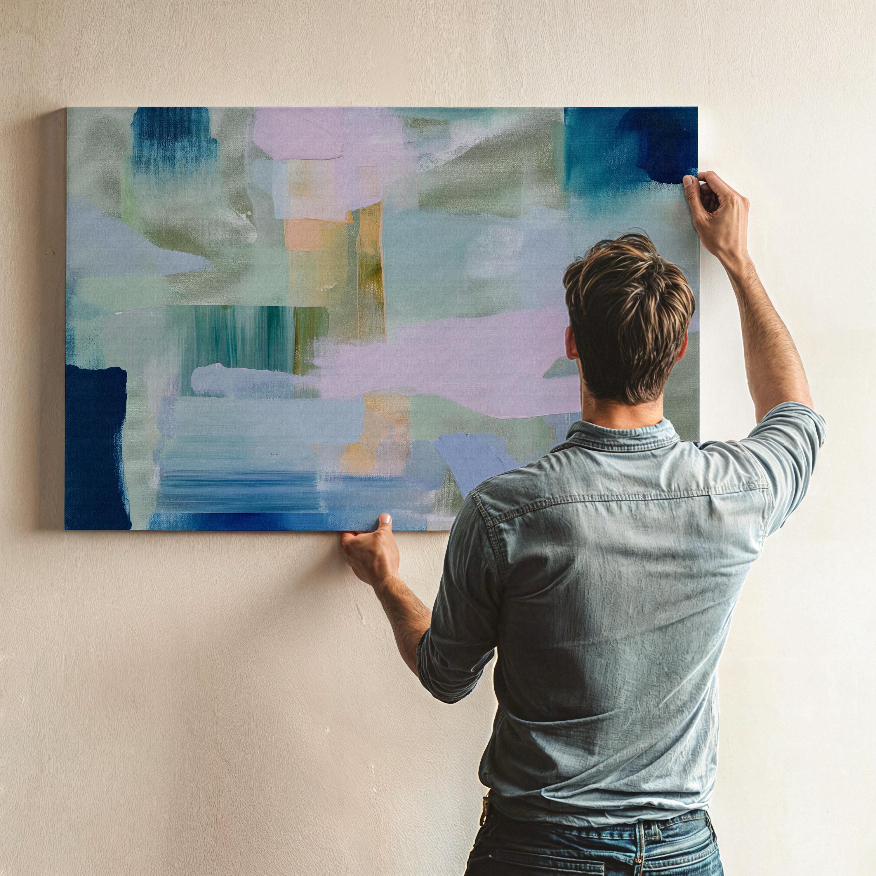 Horizontal abstract canvas wall art featuring sage, teal, and blush brushstrokes in a layered horizon style. The oversized painting reflects transitional and soft contemporary design, ideal for living rooms, offices, or dining rooms. Offered as a gallery-wrapped canvas for modern, designer-forward decor.