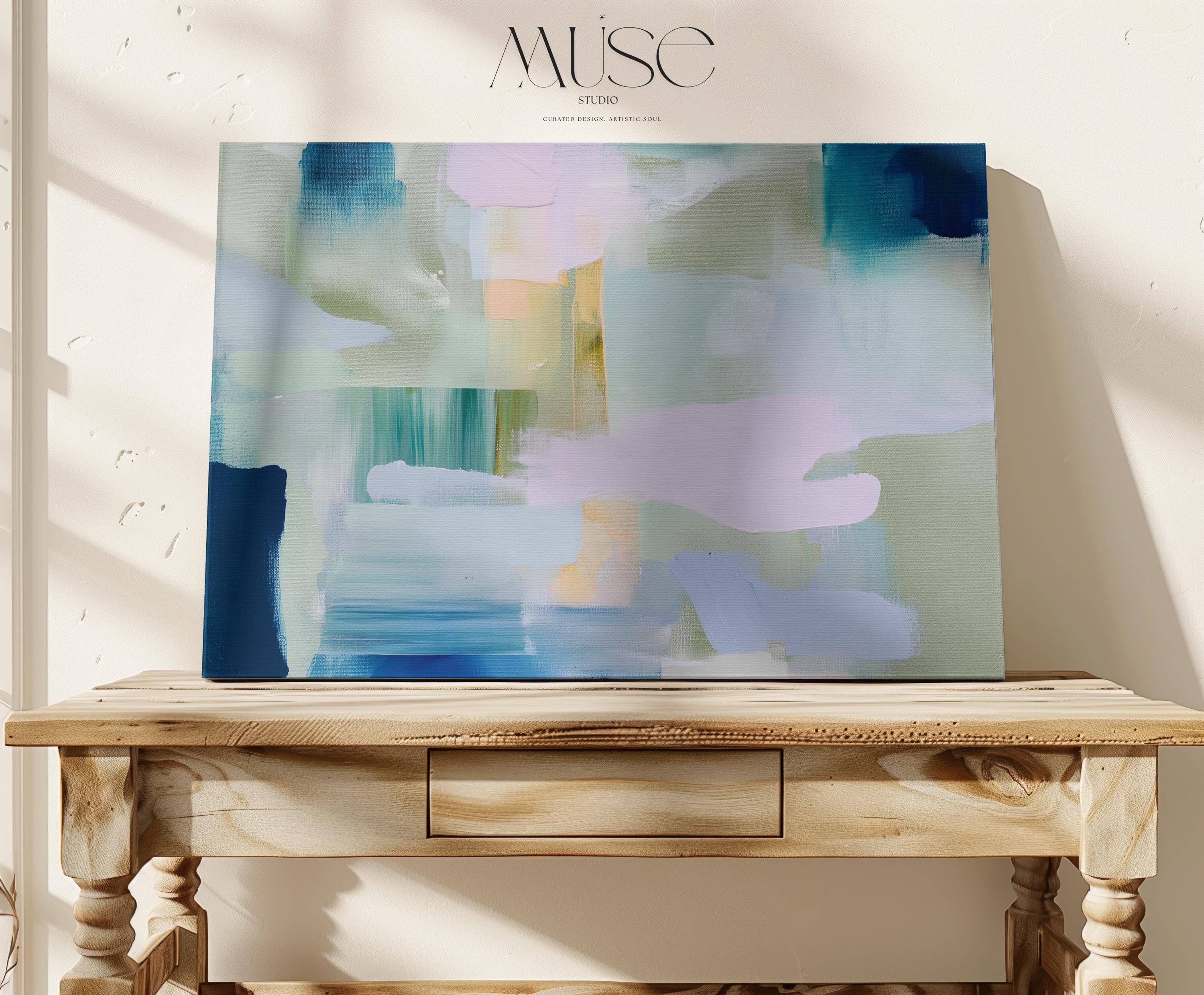 Horizontal abstract canvas wall art featuring sage, teal, and blush brushstrokes in a layered horizon style. The oversized painting reflects transitional and soft contemporary design, ideal for living rooms, offices, or dining rooms. Offered as a gallery-wrapped canvas for modern, designer-forward decor.