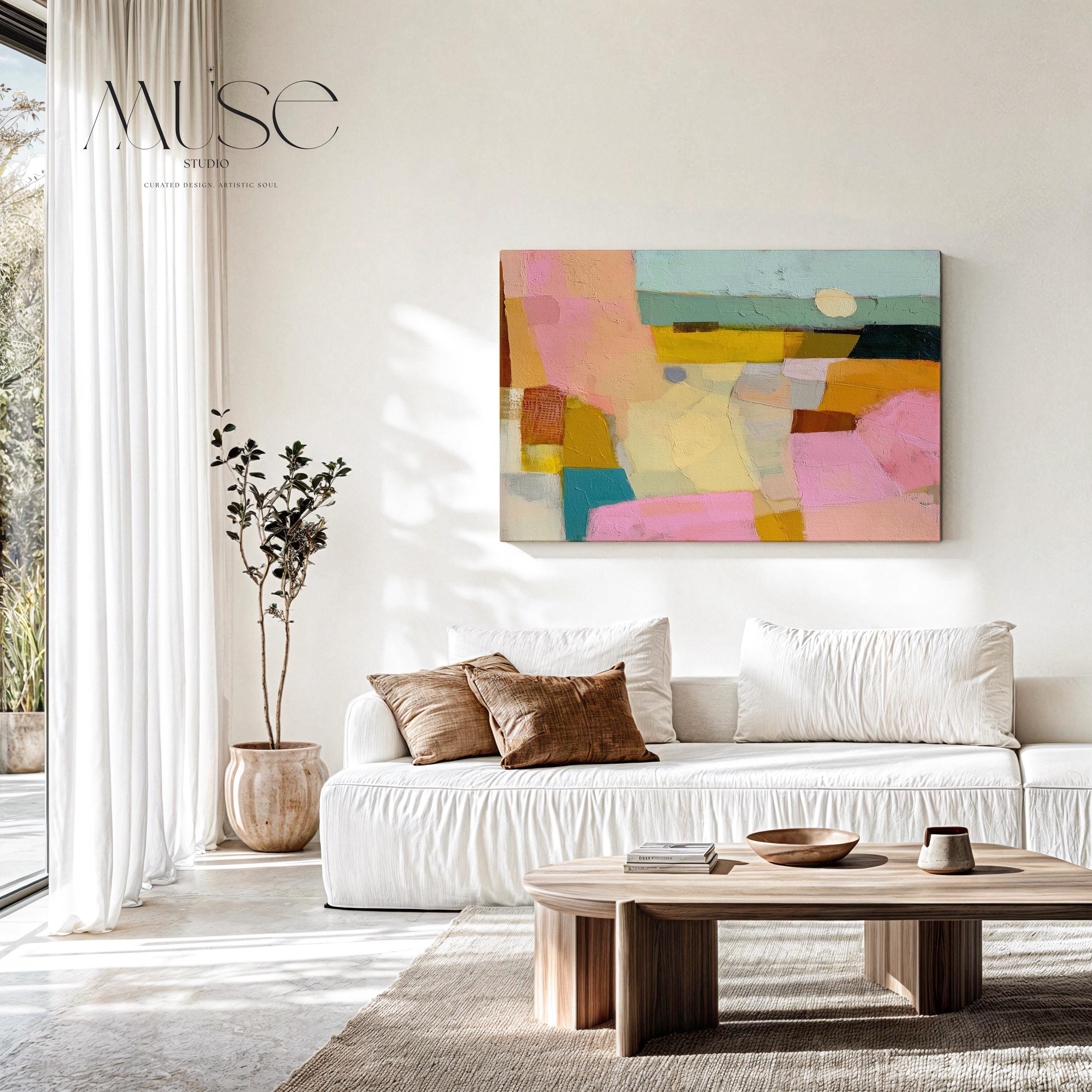 Horizontal abstract canvas wall art with pink, yellow, teal, and neutral pastel tones in a textural geometric design. This bold yet balanced artwork complements boho and transitional interiors, making it perfect for living rooms, bedrooms, or entryway walls. With its vibrant palette and painterly details, it adds boutique warmth and personality to any space. Available as a gallery-wrapped canvas, framed canvas, or fine art poster print.