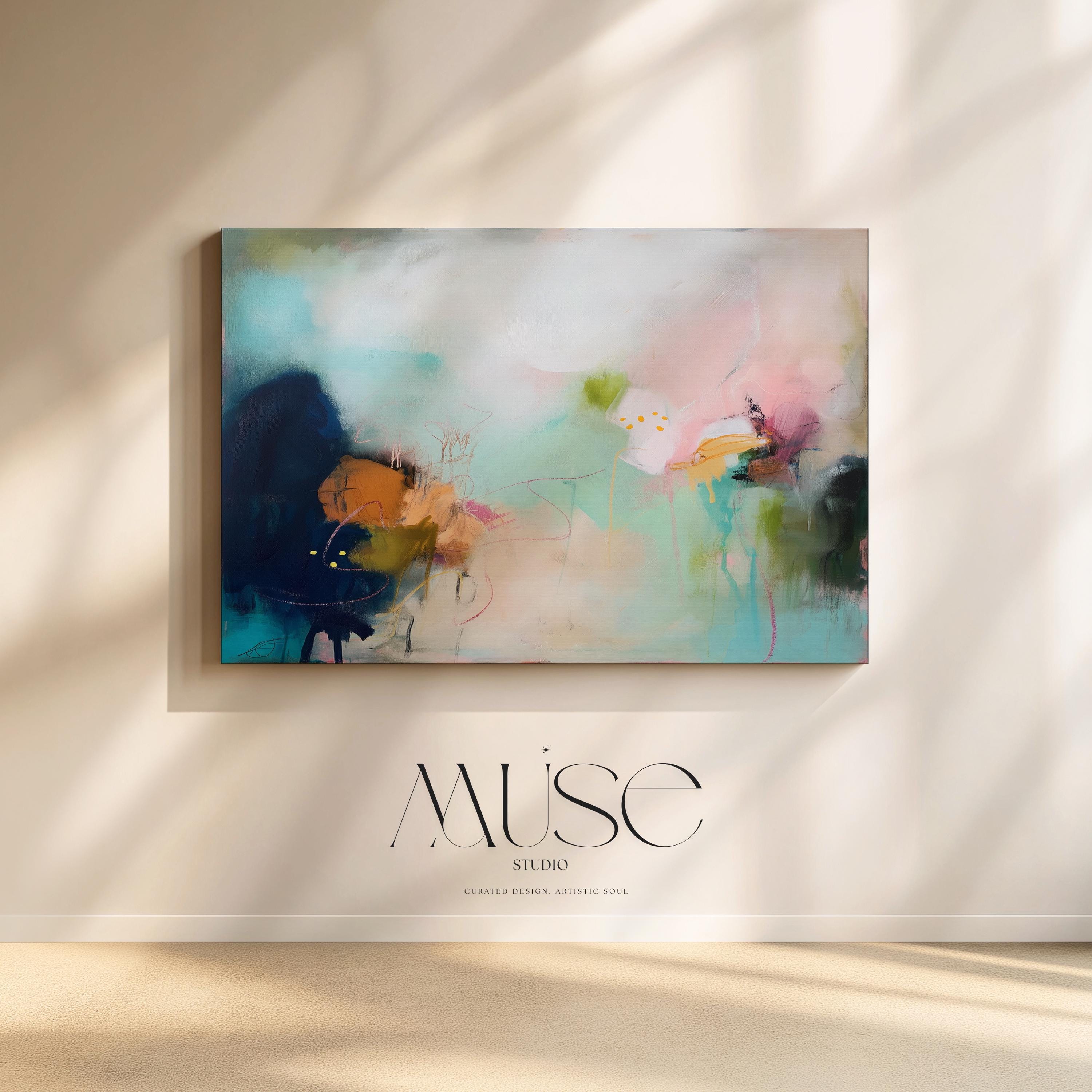 Muse Studio large horizontal coastal seascape wall art featuring a misty ocean abstract in soft pink, teal, aqua, and blue-green tones. Premium gallery-wrapped canvas printed with museum-grade giclée inks, styled for modern beach house decor, coastal living rooms, bedrooms, and statement seaside interiors.
