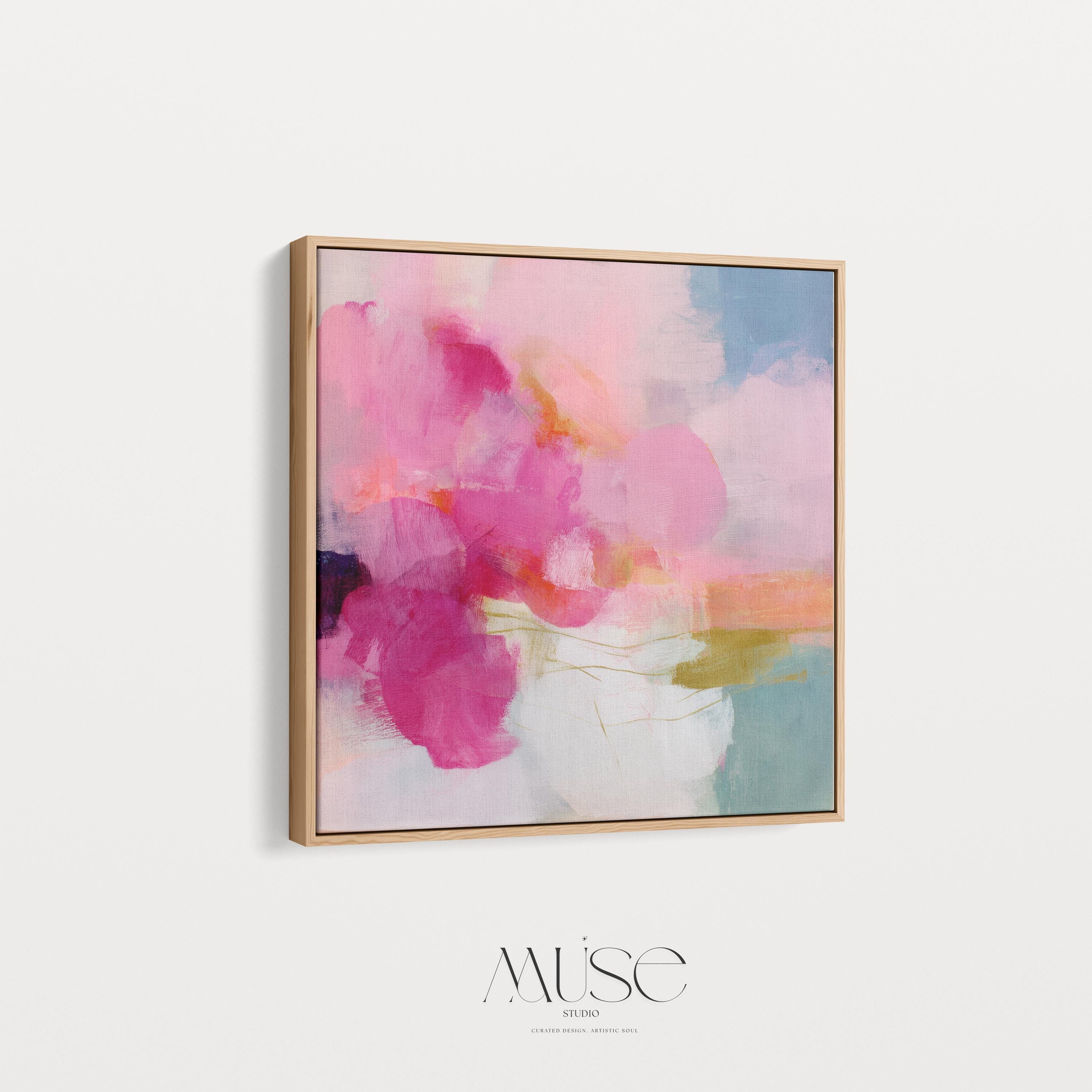 Framed square canvas wall art featuring bold pink and coral brushstrokes with teal and golden undertones. This abstract artwork blends boho, transitional, and soft contemporary design, perfect for bedrooms, living rooms, or entryway decor. Available as framed or gallery-wrapped canvas.