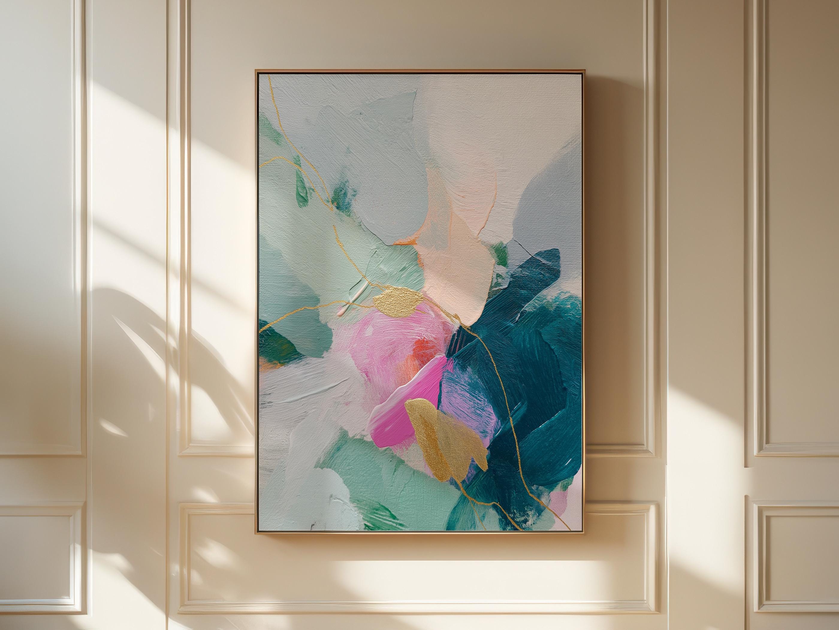 Vertical abstract canvas wall art featuring teal, blush pink, and gold accents with layered brush texture. Designed for transitional and modern interiors, this piece enhances bedrooms, hallways, or living rooms. Available framed or as a gallery-wrapped canvas for curated, designer-forward decor.
