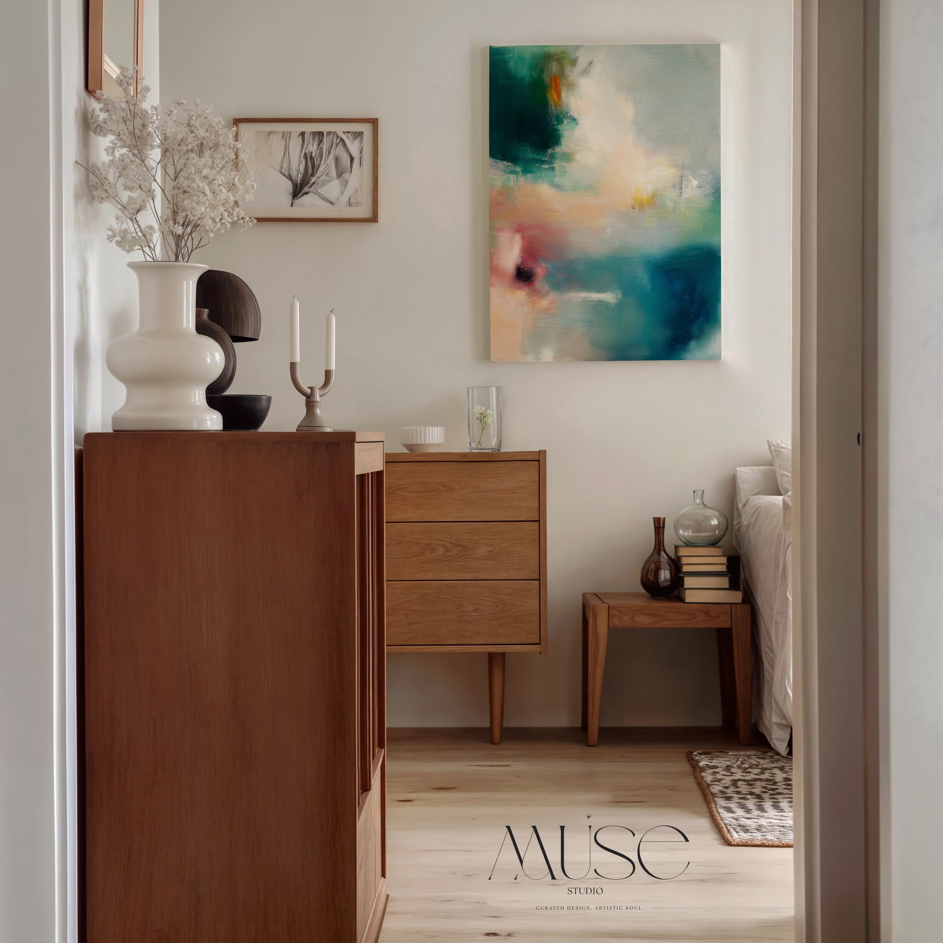Large vertical abstract canvas wall art featuring teal, blush pink, and gold tones in layered brushstrokes. The soft coastal palette and luminous texture complement transitional, modern, and soft contemporary interiors. Available as a gallery-wrapped canvas in multiple sizes for curated, designer-forward decor.
