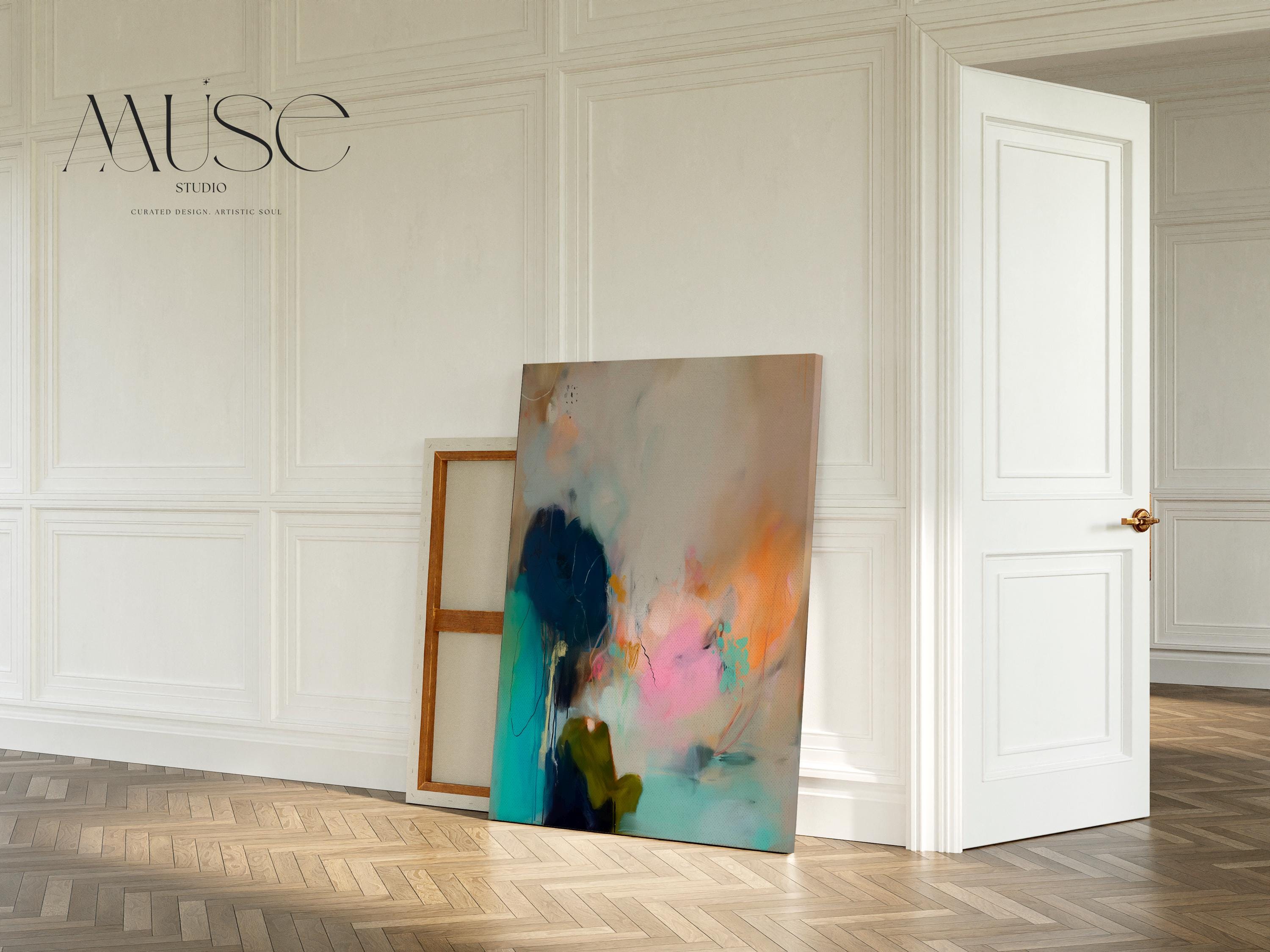 Vertical abstract canvas wall art featuring teal, blush, and peach brushstrokes with soft white layers. The composition exudes modern warmth and calm movement, perfect for living rooms, bedrooms, or transitional interiors. Available as a large gallery-wrapped canvas in premium cotton for a refined, designer-quality finish.
